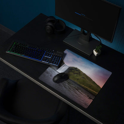 Premium large scenic sunset gaming mouse pad with green cliffside waterfall, non-slip backing, stitched edges