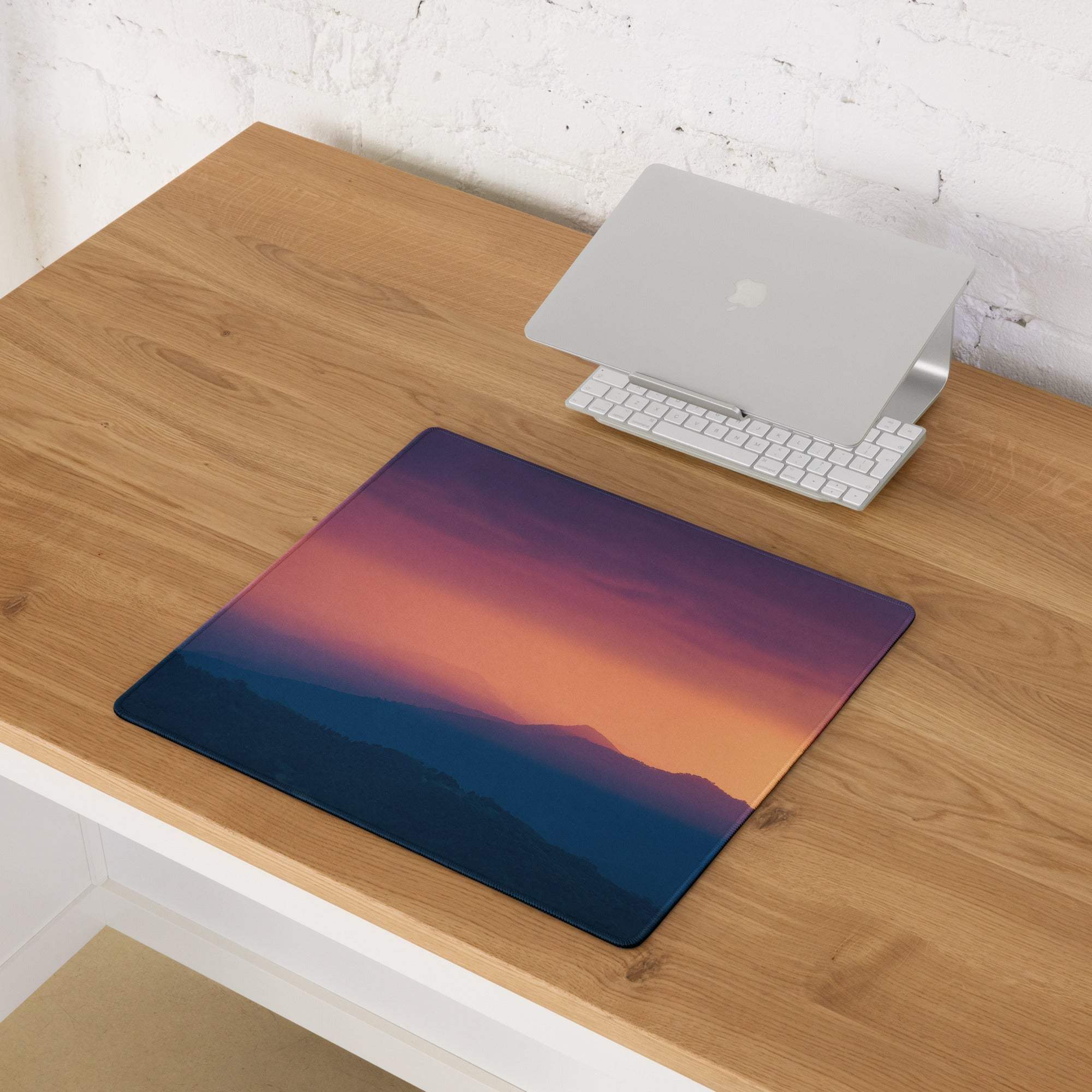 Stylish sunset purple orange gaming mouse pad with gradient blues and non-slip base
