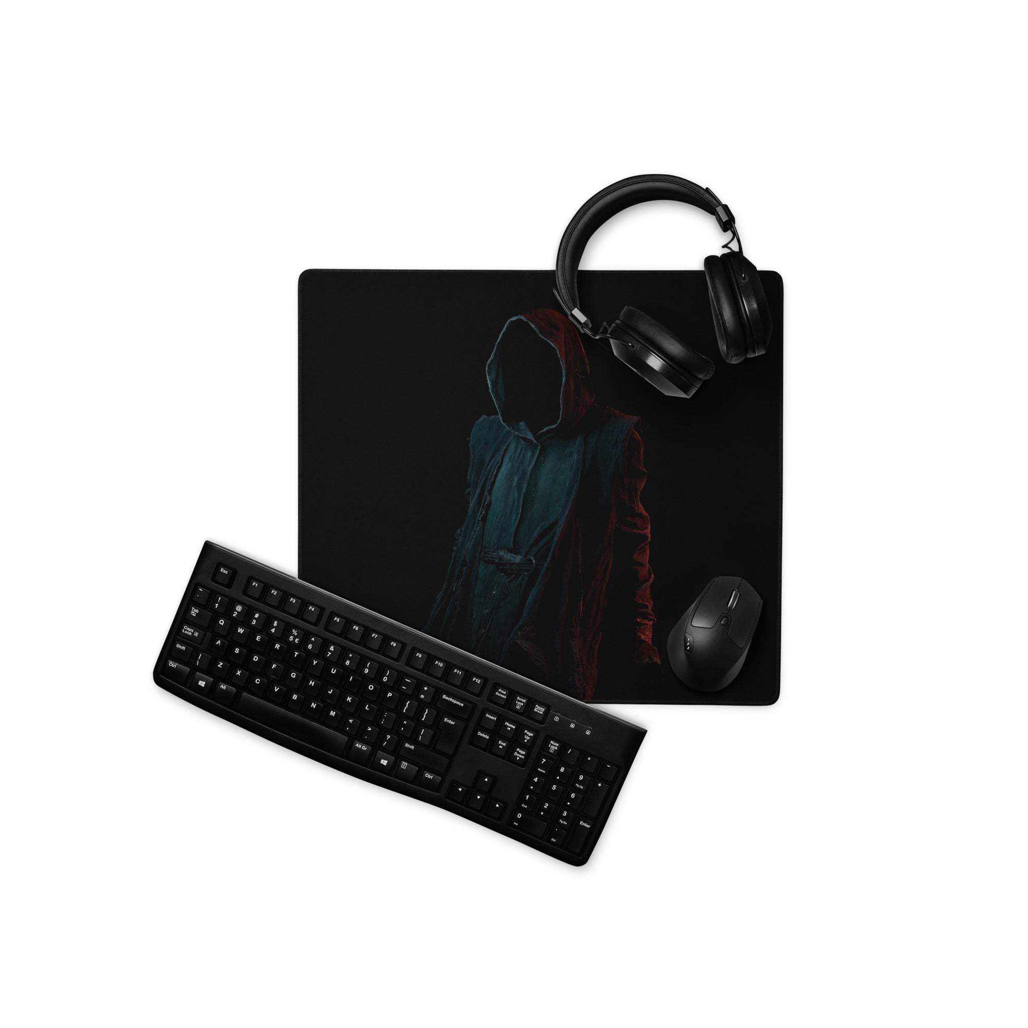 Black gaming mousepad with dark hooded figure, teal red accents, non-slip base