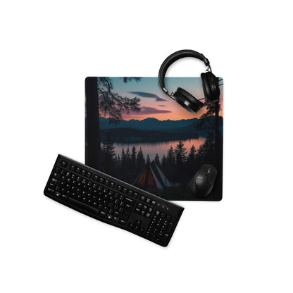 Black ergonomic QWERTY keyboard on Sunset Forest gaming mouse pad