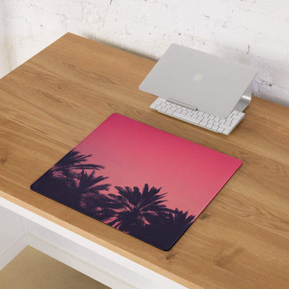 Large pink to purple sunset gaming mouse pad with palm silhouettes, non-slip base