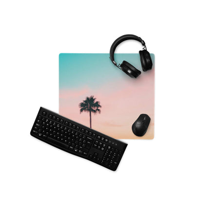 Large pastel sunset palm tree gaming mouse pad with teal to pink gradient and non-slip desk mat design