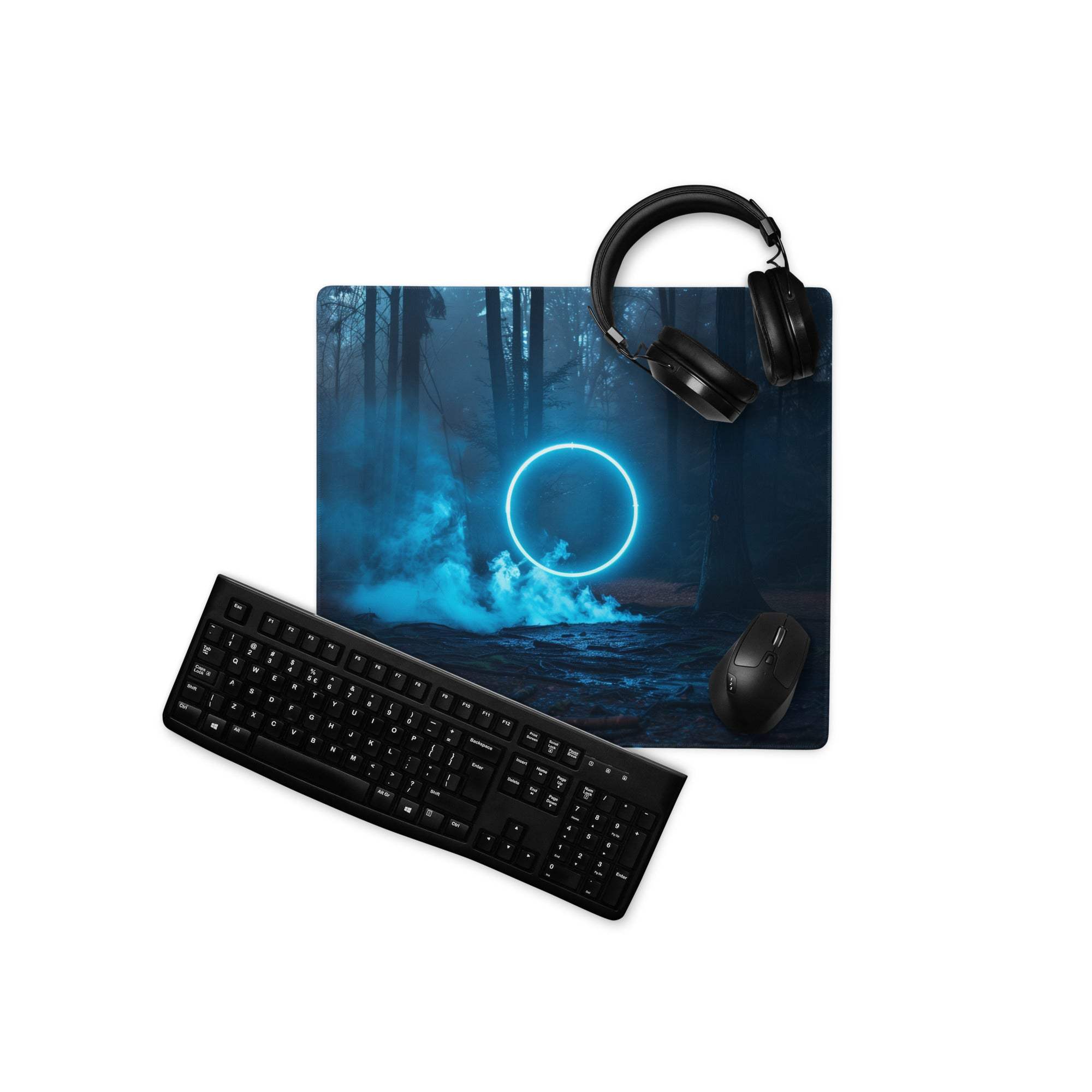 Black gaming mousepad with glowing blue neon light over misty forest