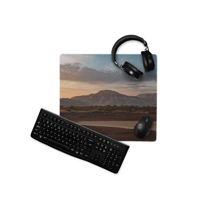 Black wireless keyboard on Sunset Mountain gaming mouse pad