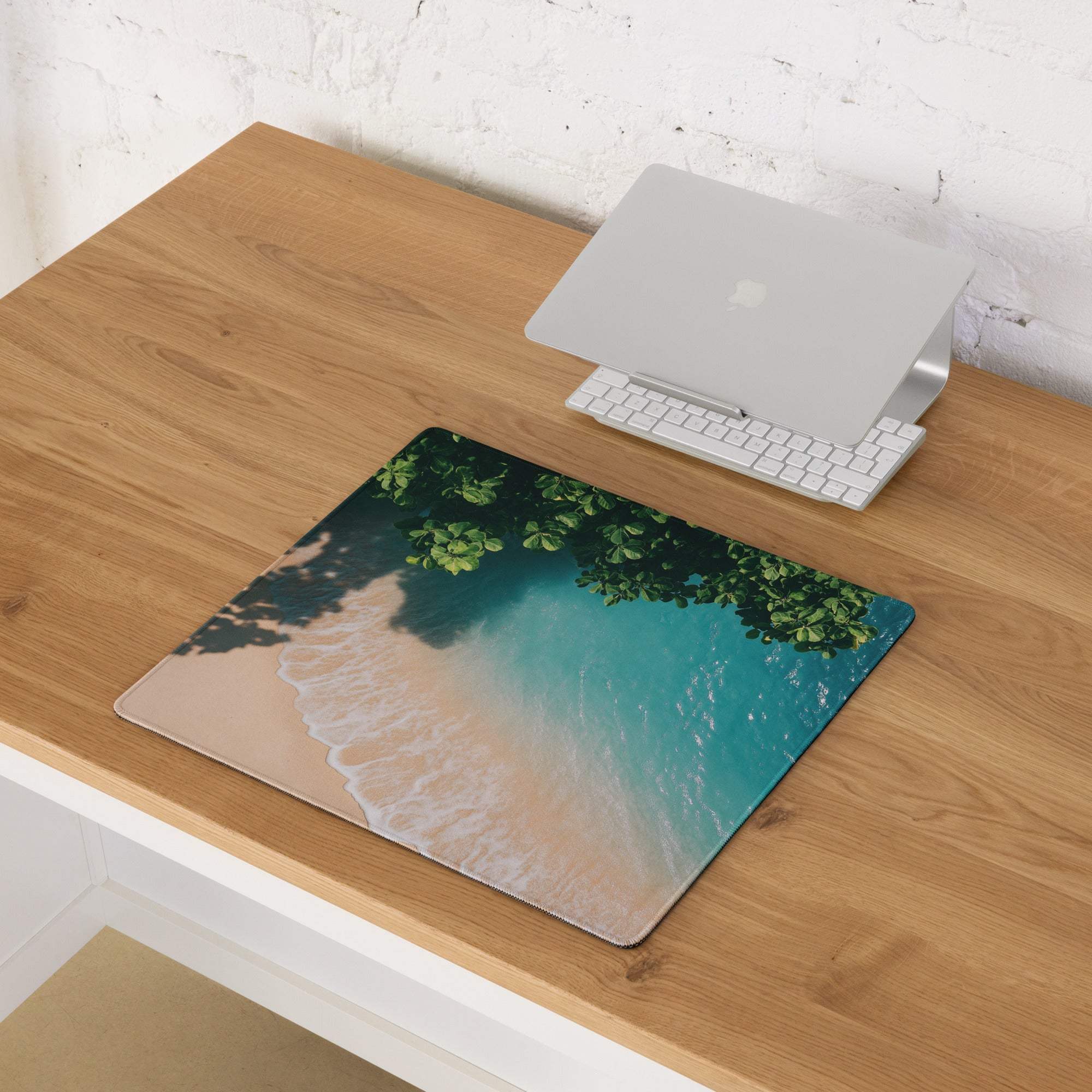 Premium large beige teal ocean beach mousepad with green foliage