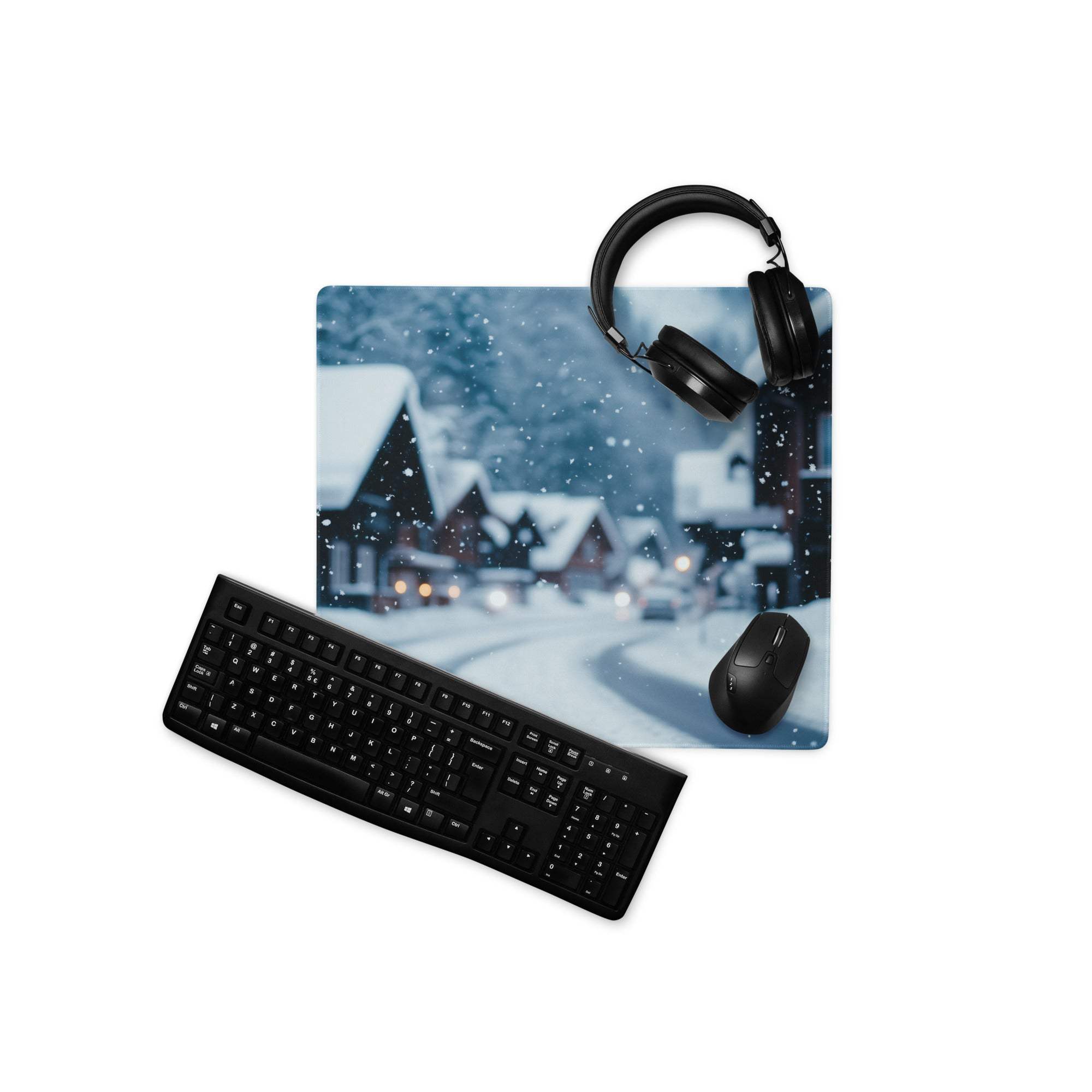 Black wireless keyboard with sleek matte finish on Winter Snow Village mouse pad