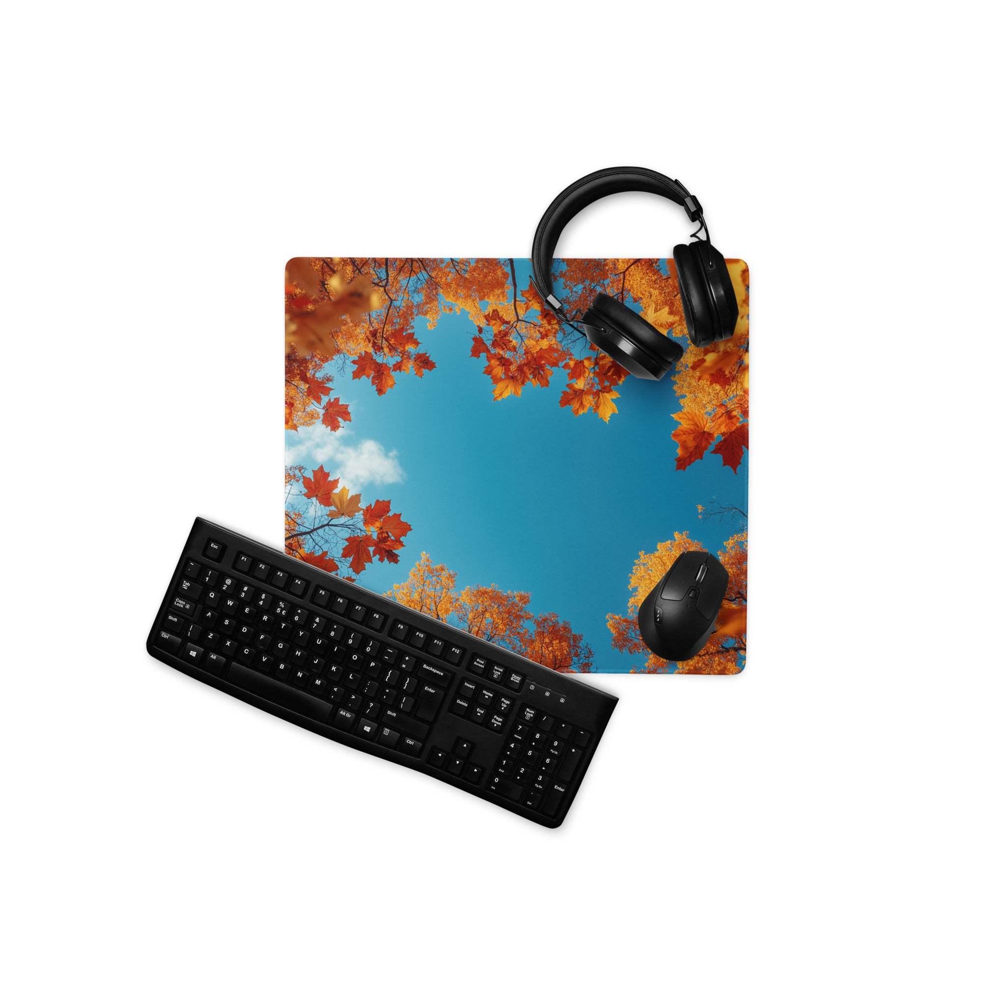 Autumn leaves frame sky blue gaming mouse pad with headphones and mouse