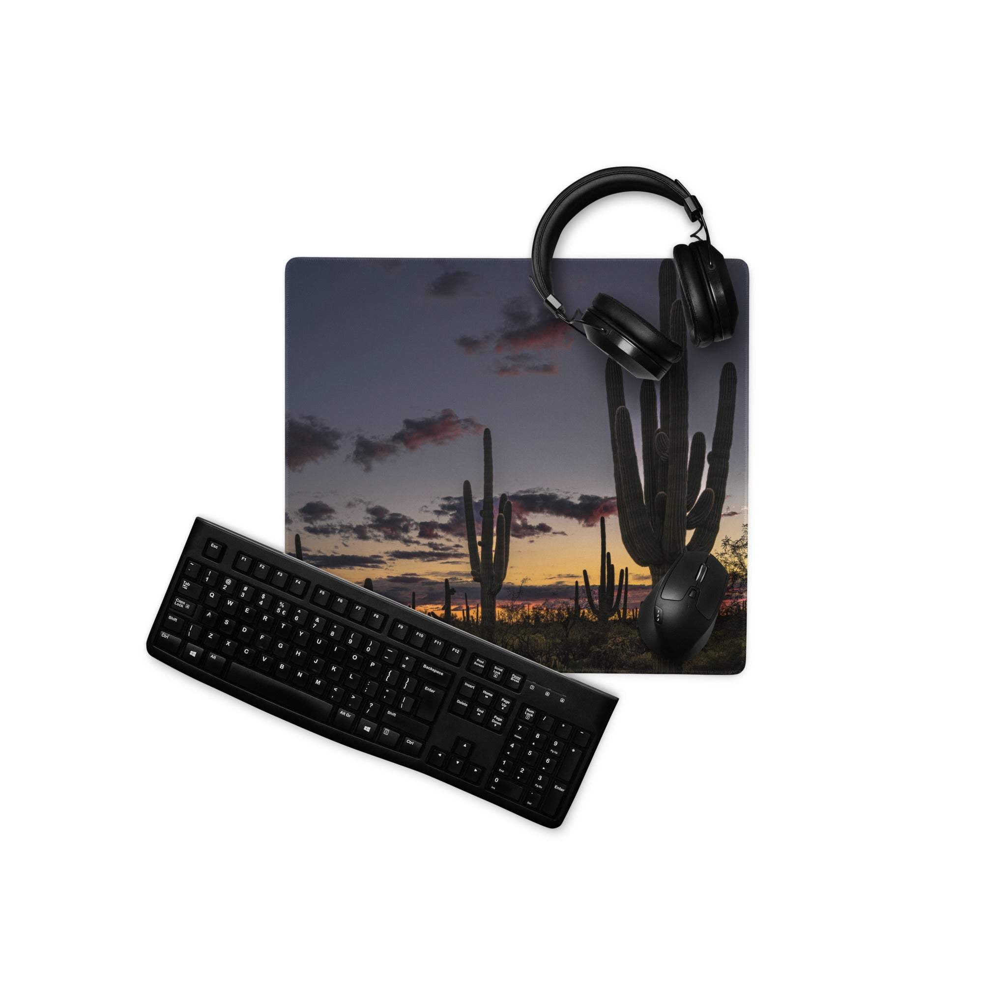Black matte QWERTY keyboard on desert sunset cactus gaming mouse pad