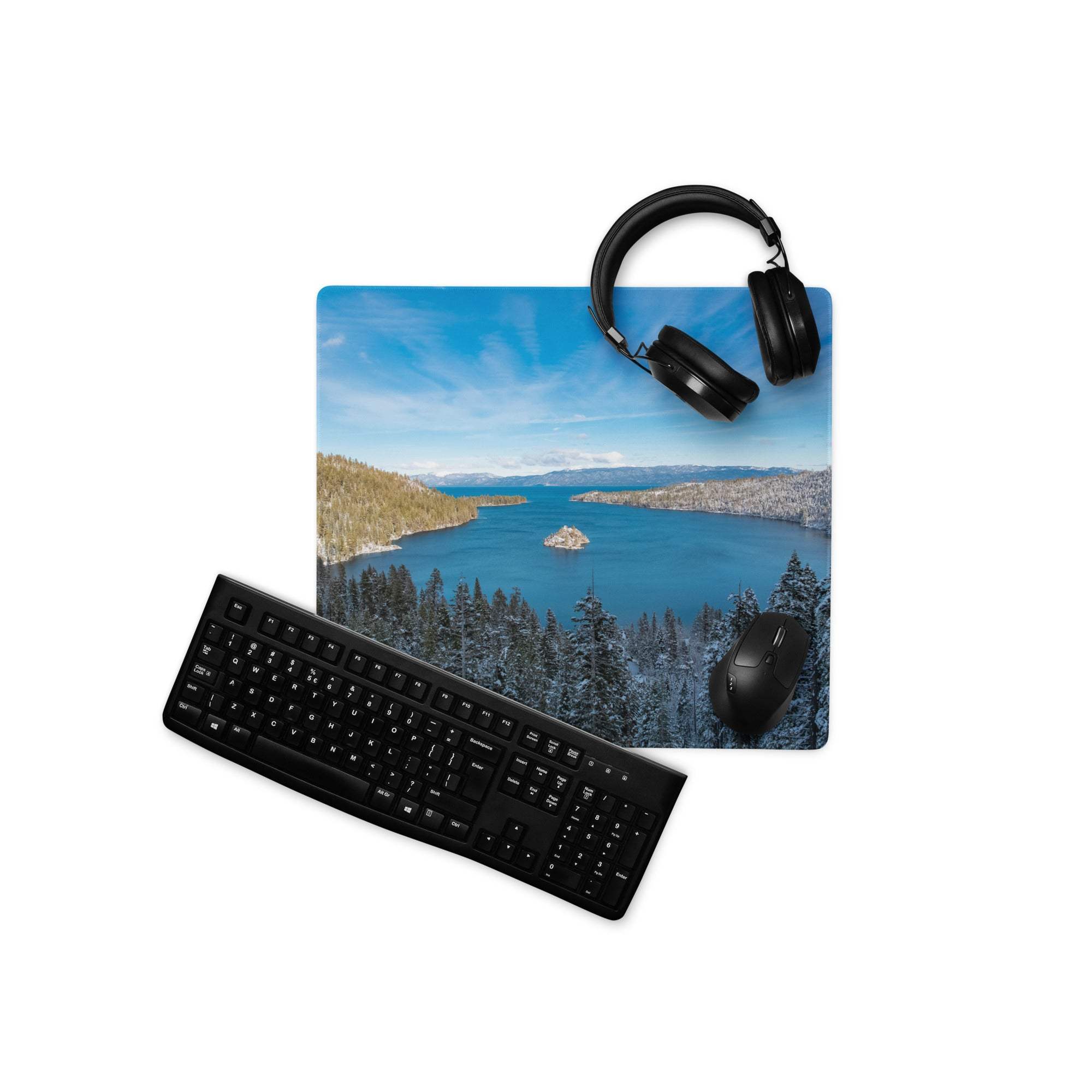 Black wireless QWERTY keyboard with matte finish on white surface