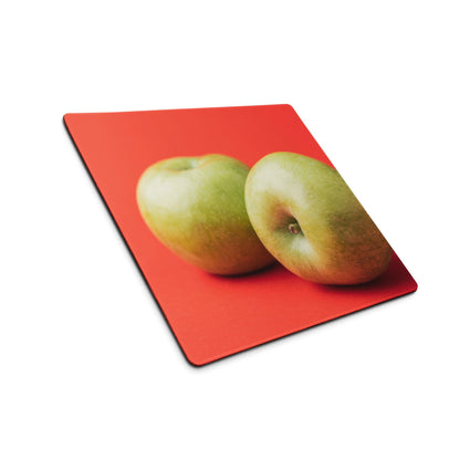 Red rectangular mousepad with two green apples print and non-slip base