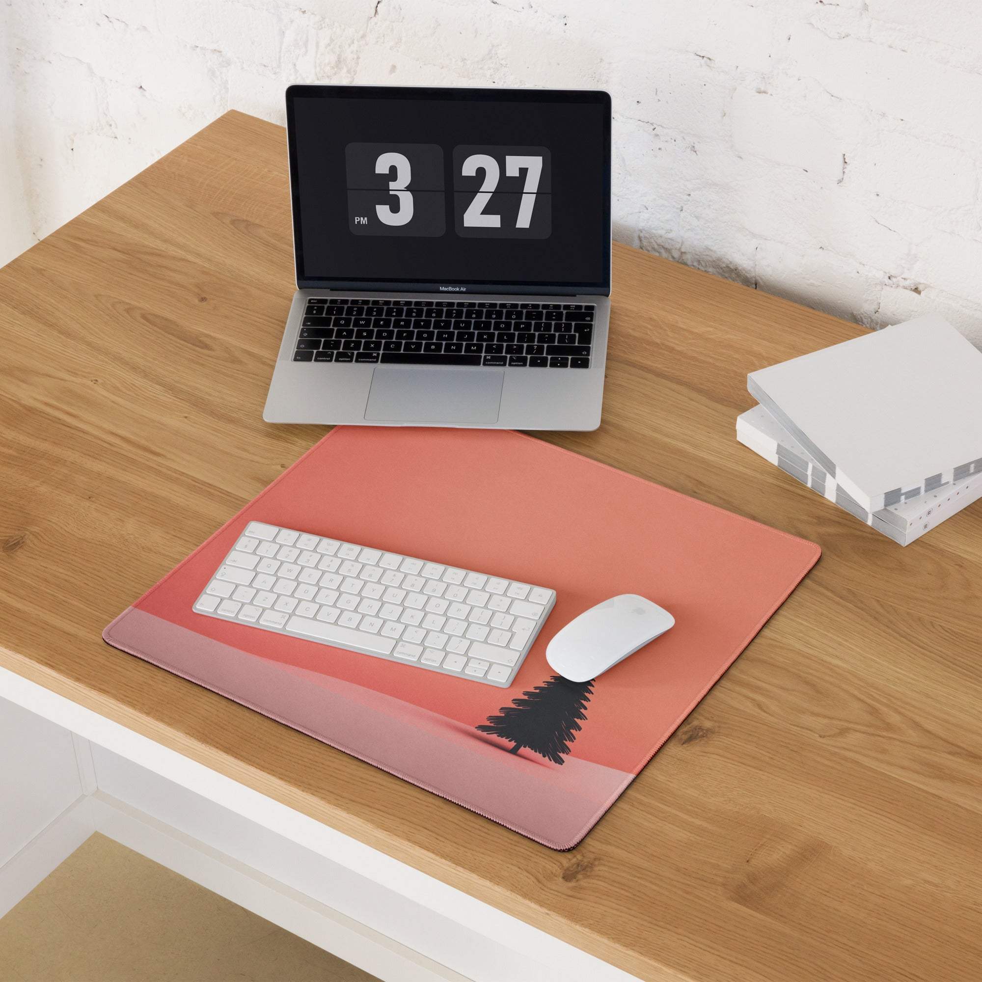 Minimalist sunset tree gaming mouse pad in coral with black pine silhouette