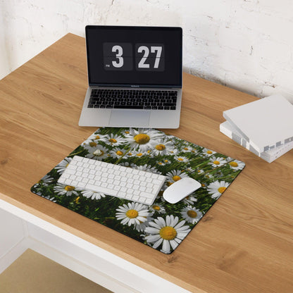 Floral daisy field gaming mouse pad with non-slip base on wooden desk