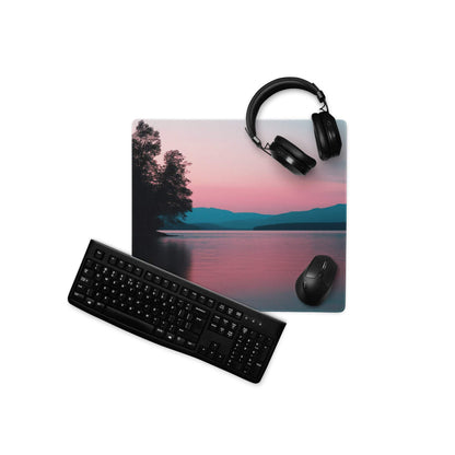 Calm sunset lakeside mouse pad with non-slip base, pink teal hues