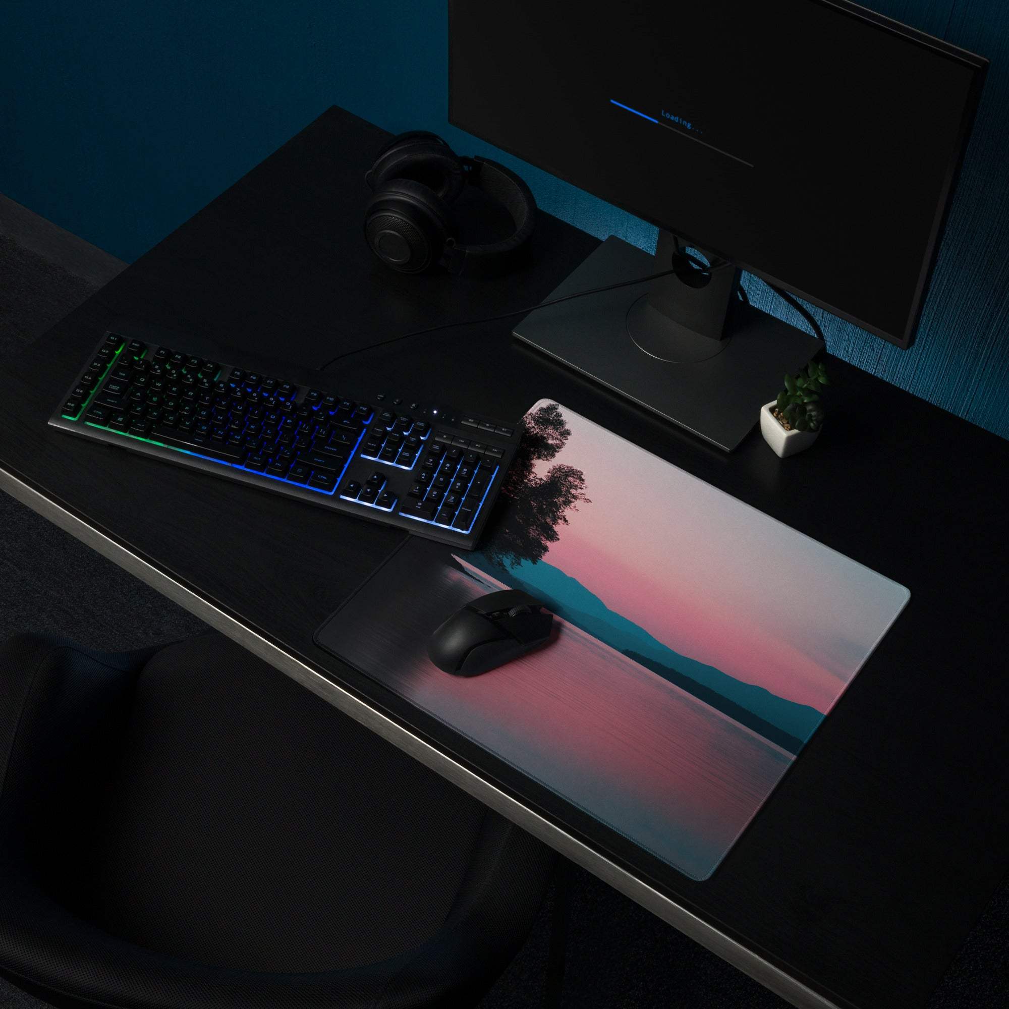 Calm sunset gaming mouse pad with pink teal hues, trees, non-slip base