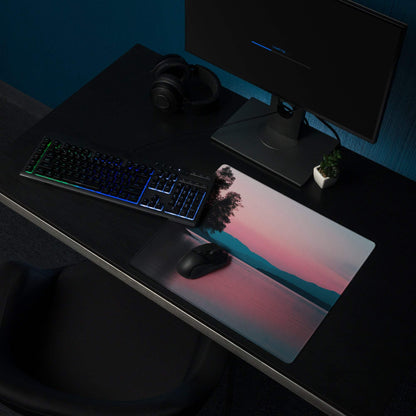 Calm sunset gaming mouse pad with pink teal hues, trees, non-slip base