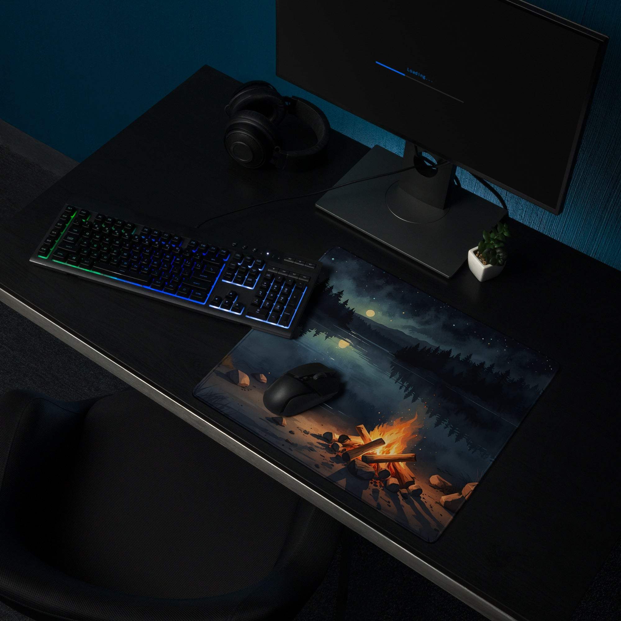 Large gaming mouse pad with night forest campfire scene, non-slip backing, edge stitching