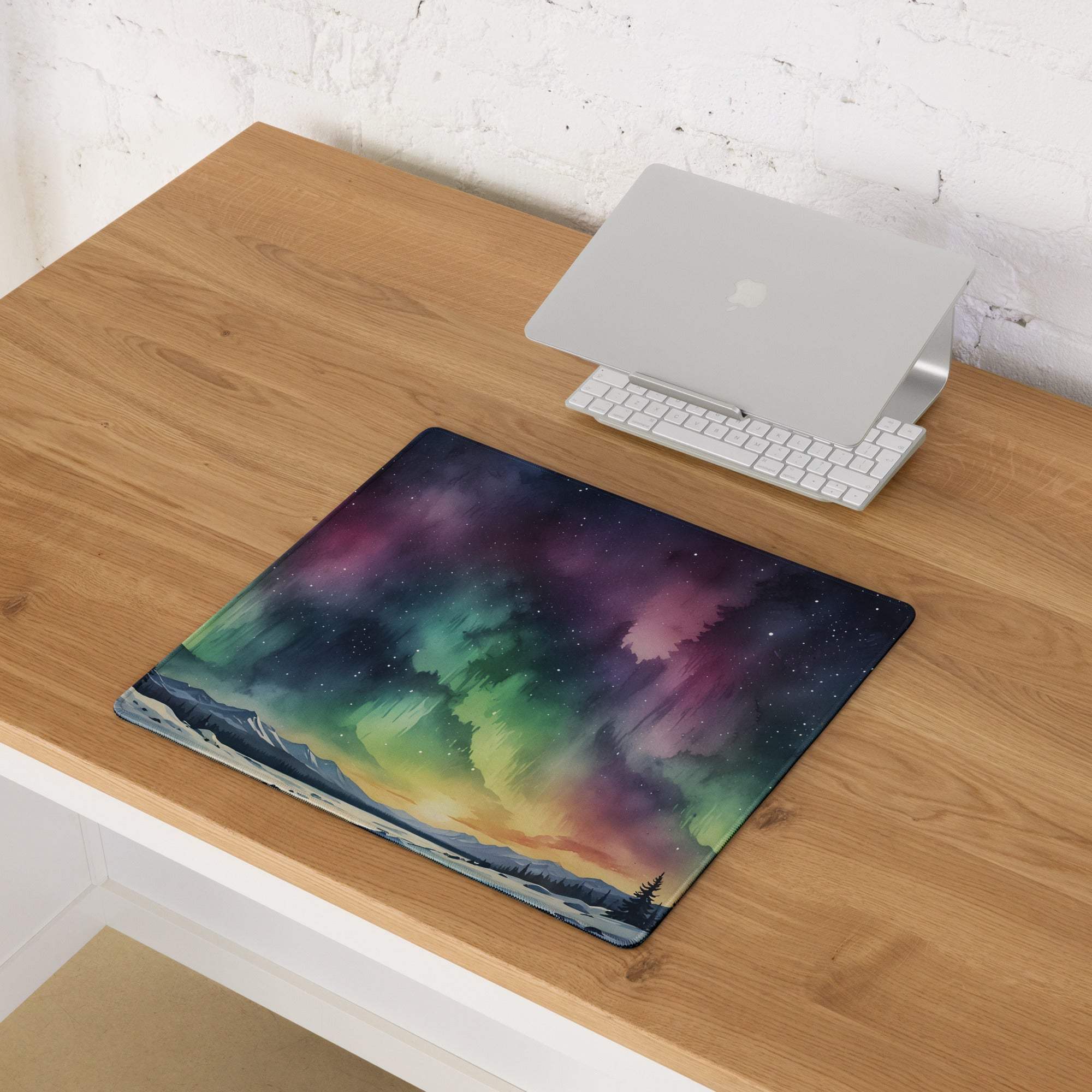 Vibrant aurora borealis gaming mouse pad with swirling greens, purples, pinks over mountains