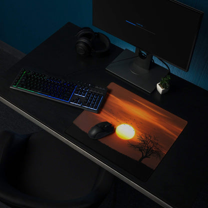 Warm sunset gaming mouse pad with orange sun, tree silhouette, birds, non-slip base