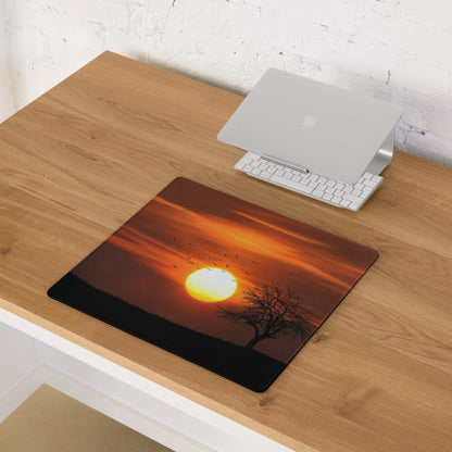 Warm sunset gaming mouse pad with orange sun, tree silhouette, birds, non-slip base
