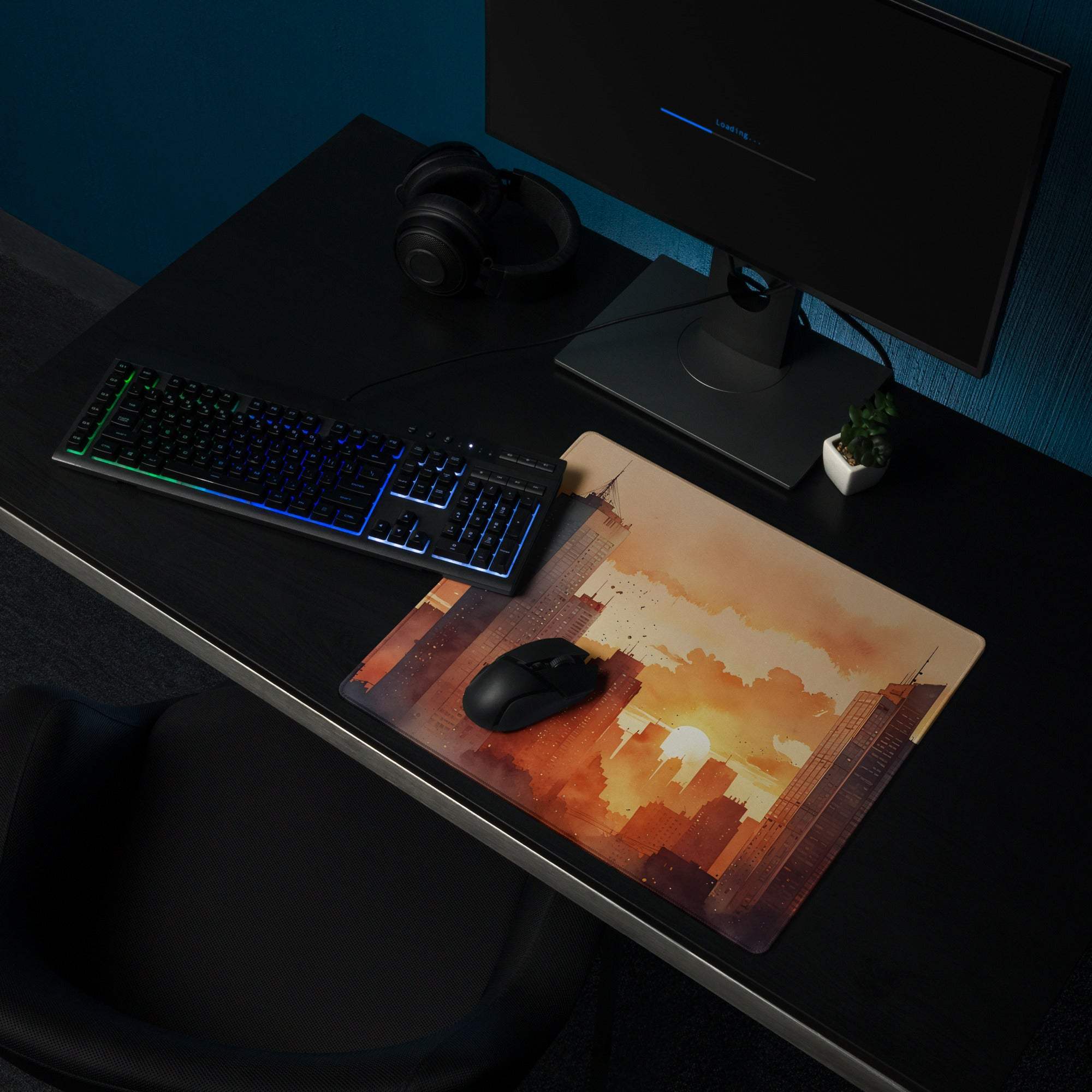 Large urban sunset cityscape gaming mouse pad in warm orange hue with non-slip edge stitching