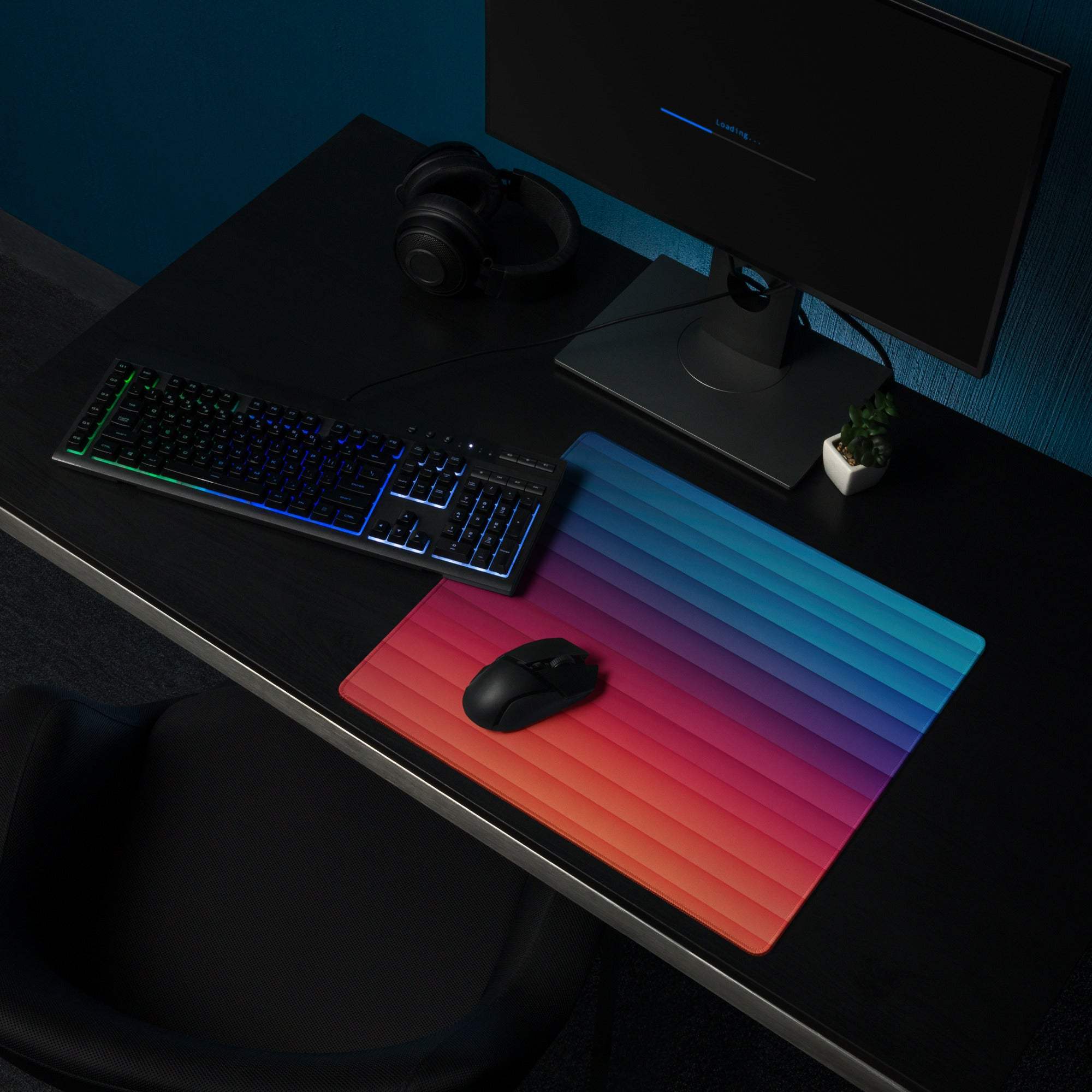 Professional gradient rainbow gaming mouse pad with large size, non-slip base, vibrant red-to-blue gradient, and grip ridges
