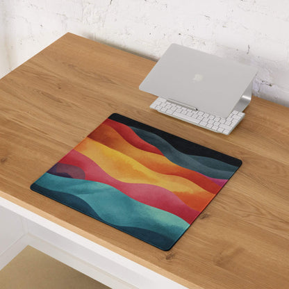 Vibrant wavy rainbow gaming mouse pad with teal orange pink yellow design
