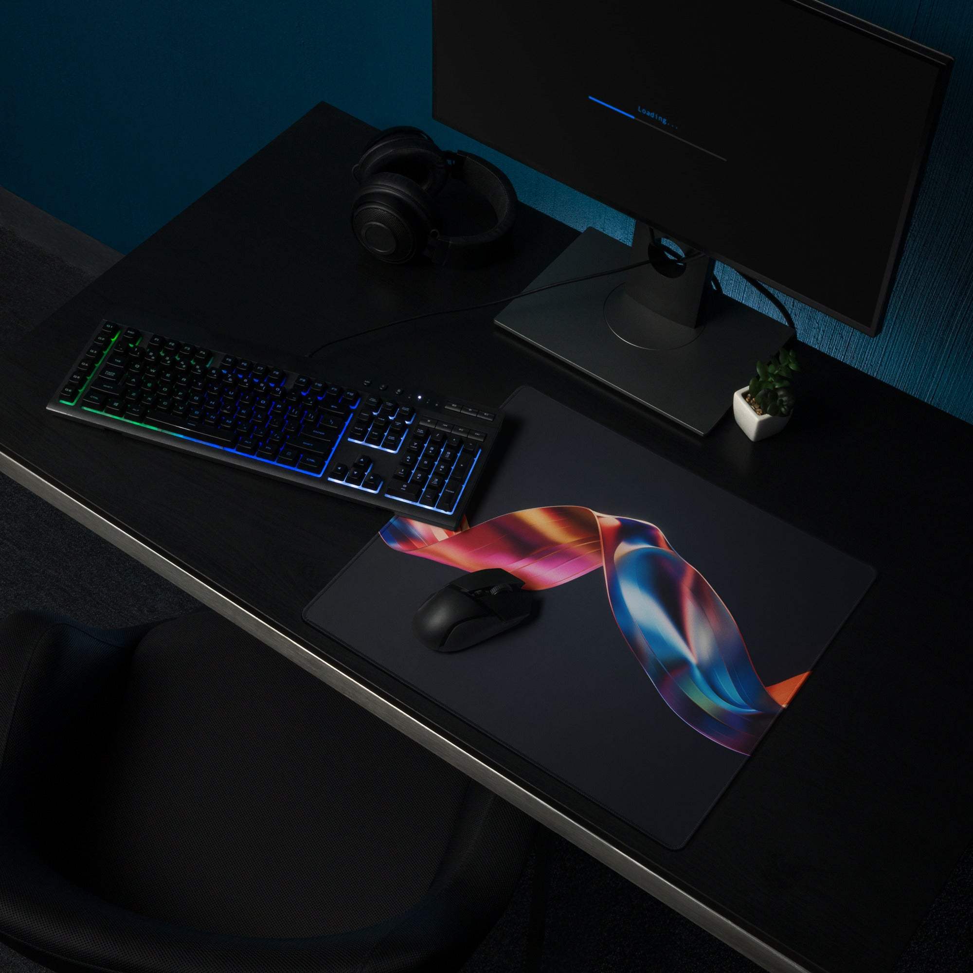 Premium dark colorful ribbon gaming mouse pad with vibrant pink orange blue purple design