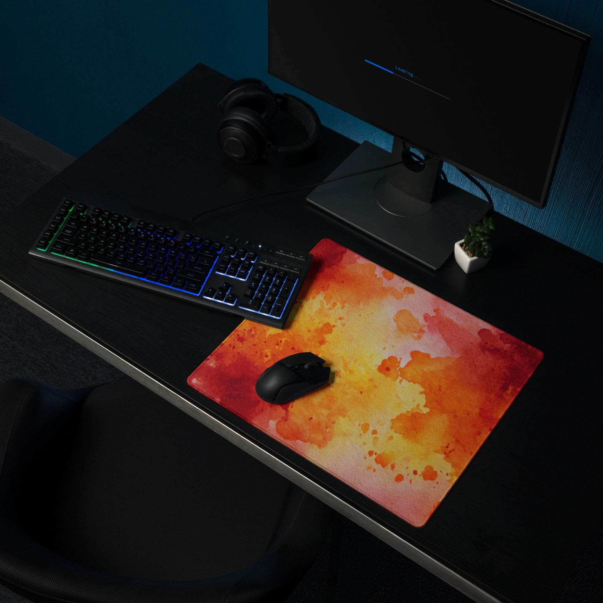 Vibrant fiery orange yellow watercolor gaming mousepad with black wireless mouse