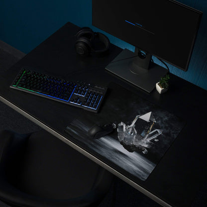 Black gaming mousepad with grayscale crystal formations, non-slip base, stitched edges
