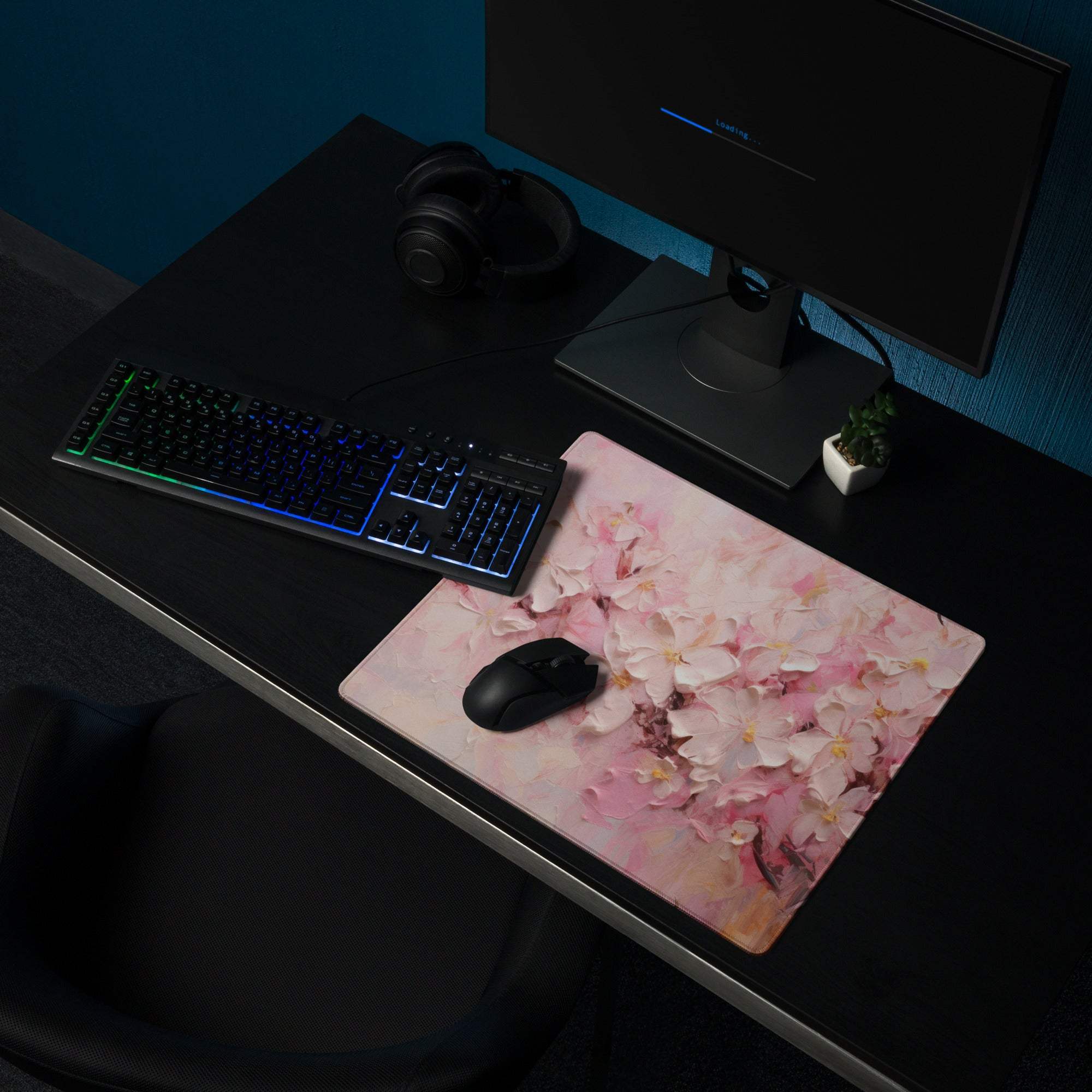 Pink cherry blossom gaming mouse pad with non-slip backing and edge stitching