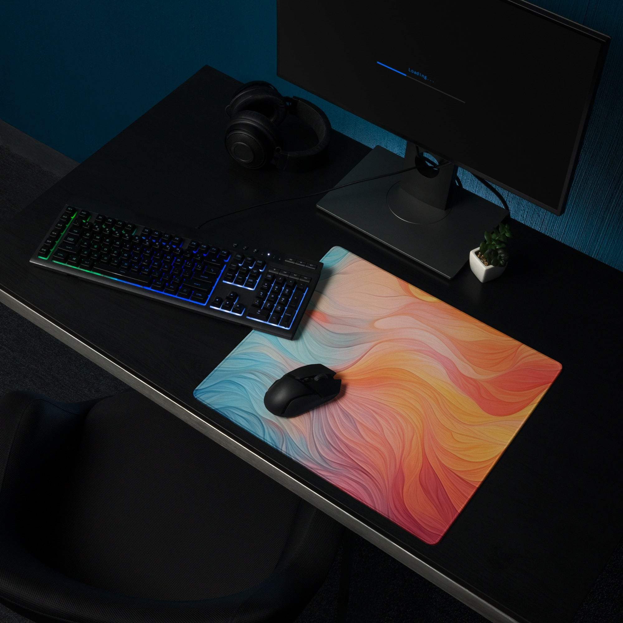 Colorful swirl gaming mouse pad with blue to orange gradient, non-slip backing