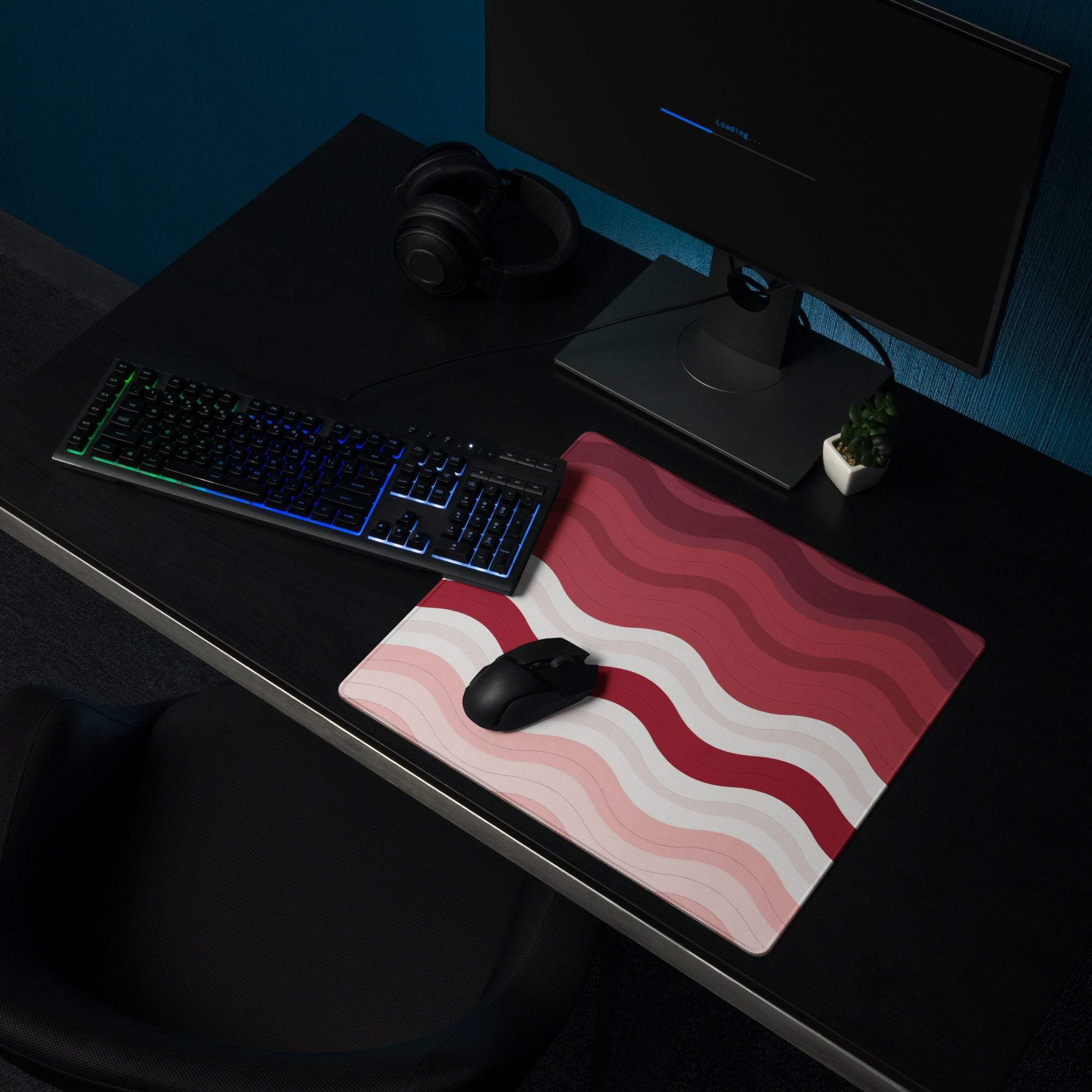Vibrant crimson rose wave gaming mouse pad with bacon pattern and non-slip base