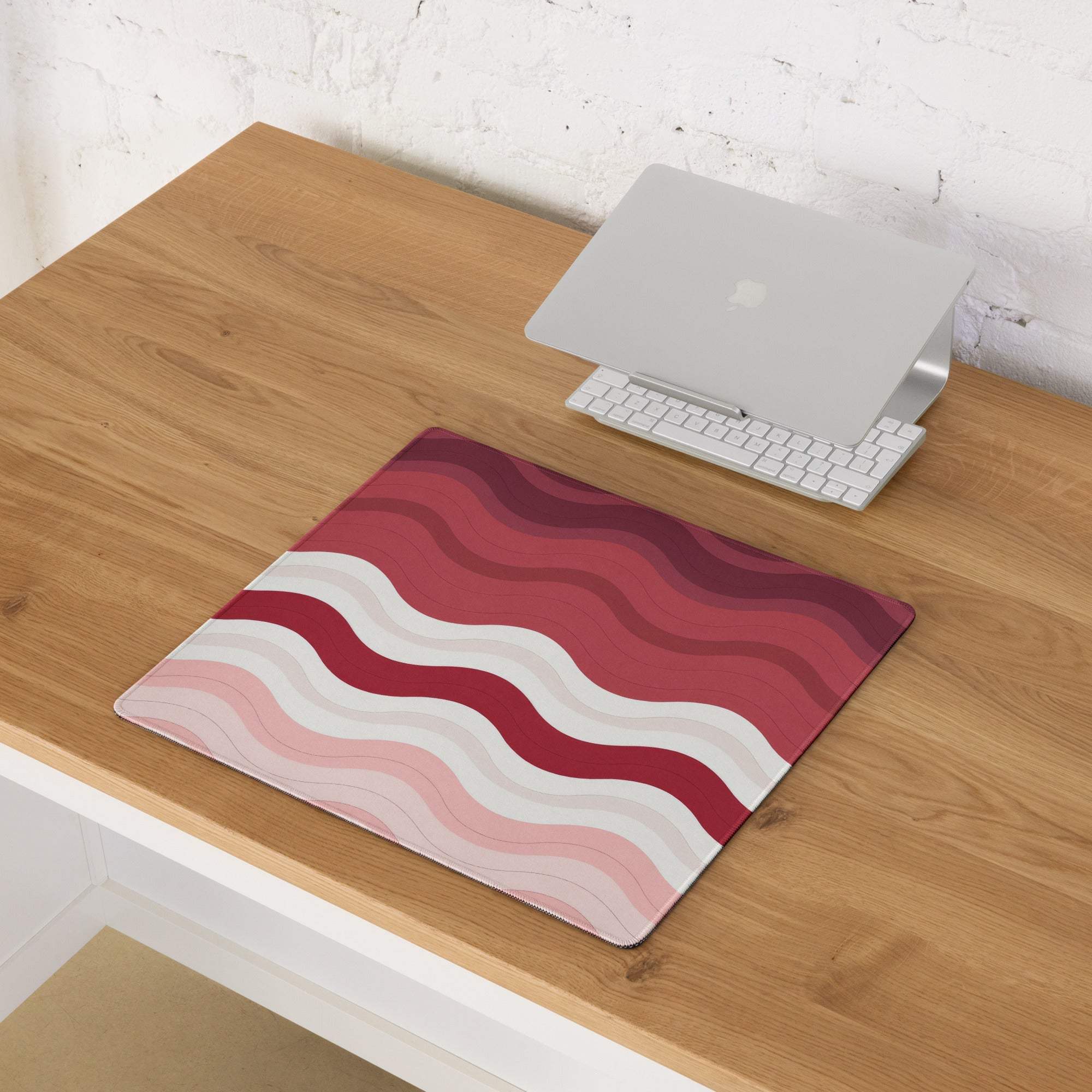 Vibrant crimson rose wave gaming mouse pad with red pink white stripes