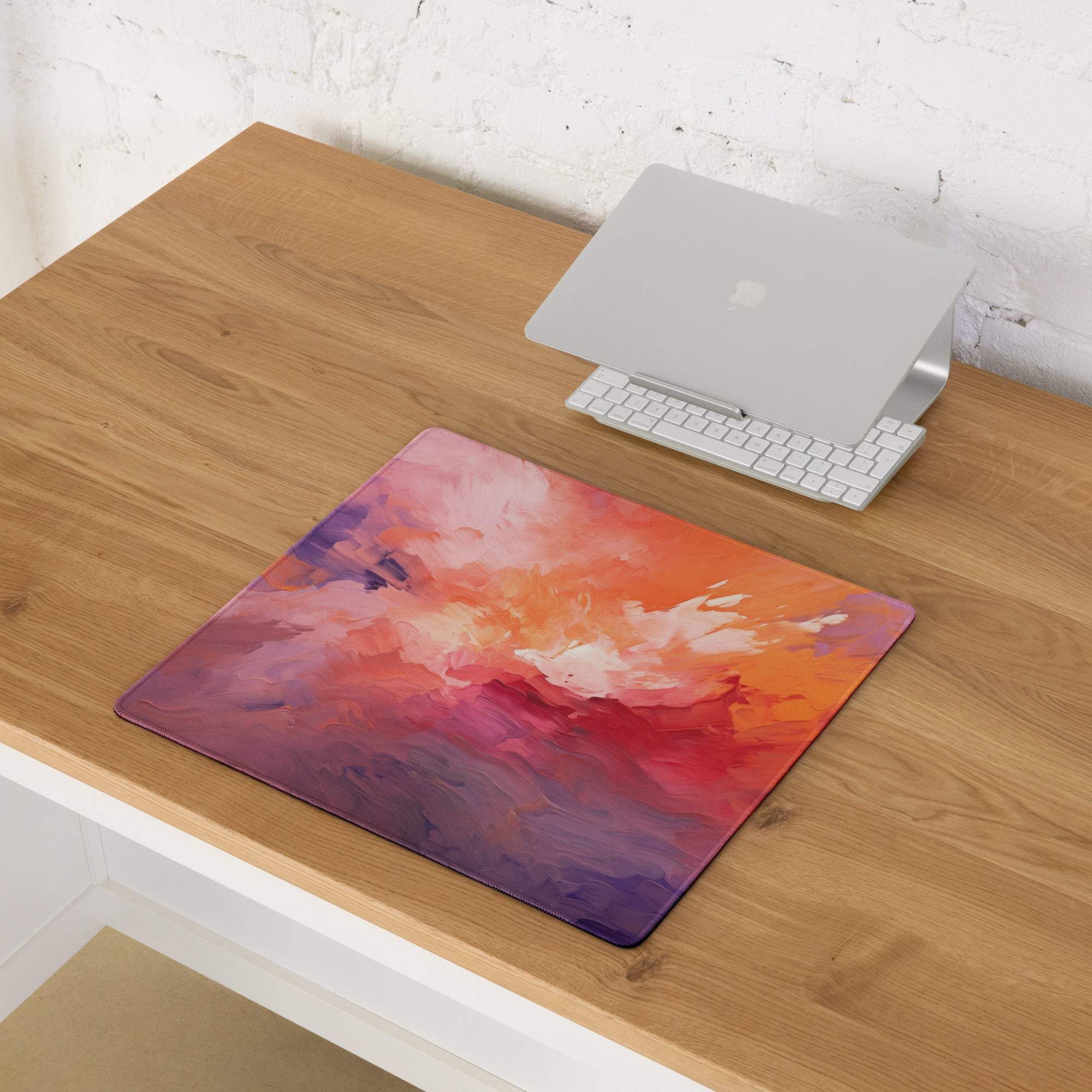 Vibrant abstract sunset gaming mouse pad with orange pink purple gradient non-slip backing