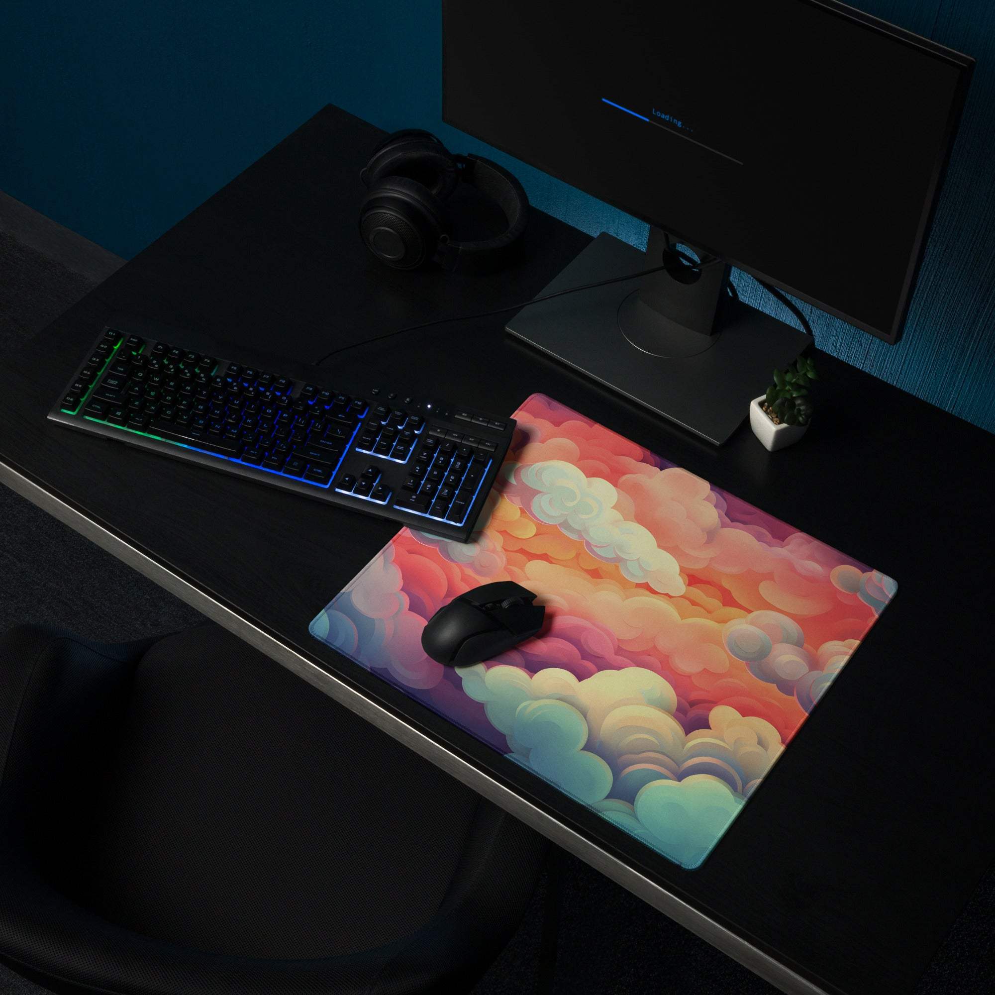 Dreamy cloudscape gaming mouse pad with vibrant pink orange teal sunrise gradient
