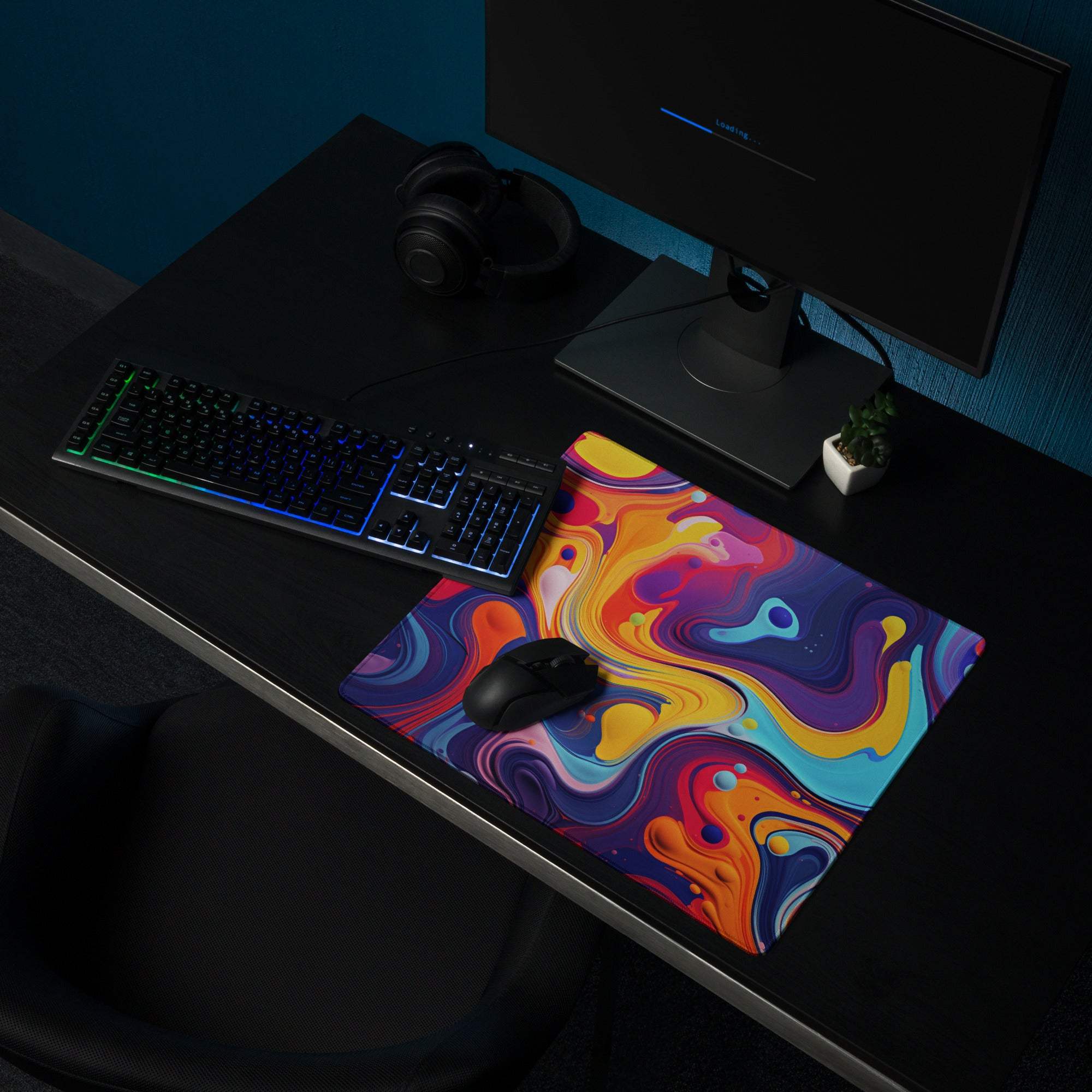 Vibrant abstract swirls in orange purple blue yellow on large gaming mouse pad
