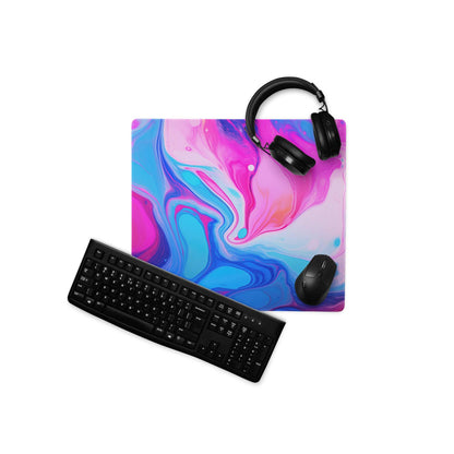 Vibrant pink blue marble swirl ultra wide gaming mousepad with black keyboard headphones