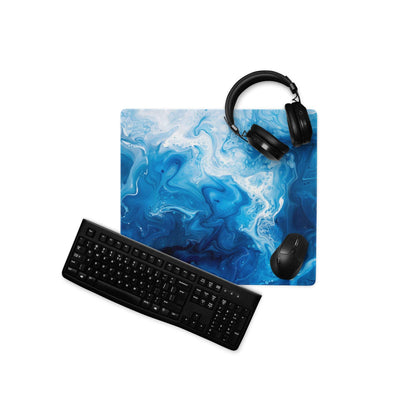 Blue marble gaming mousepad with black keyboard and headphones