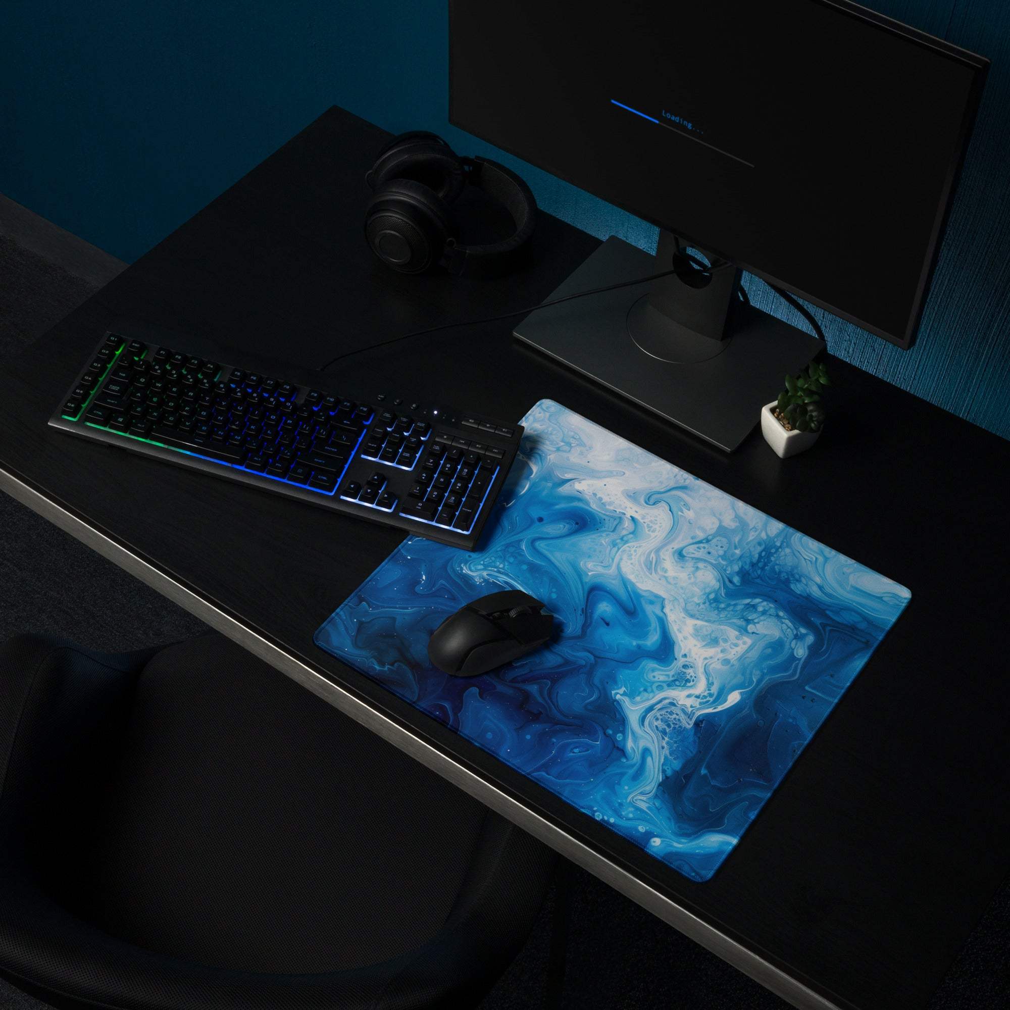 Blue white marbled gaming mousepad with black wireless mouse