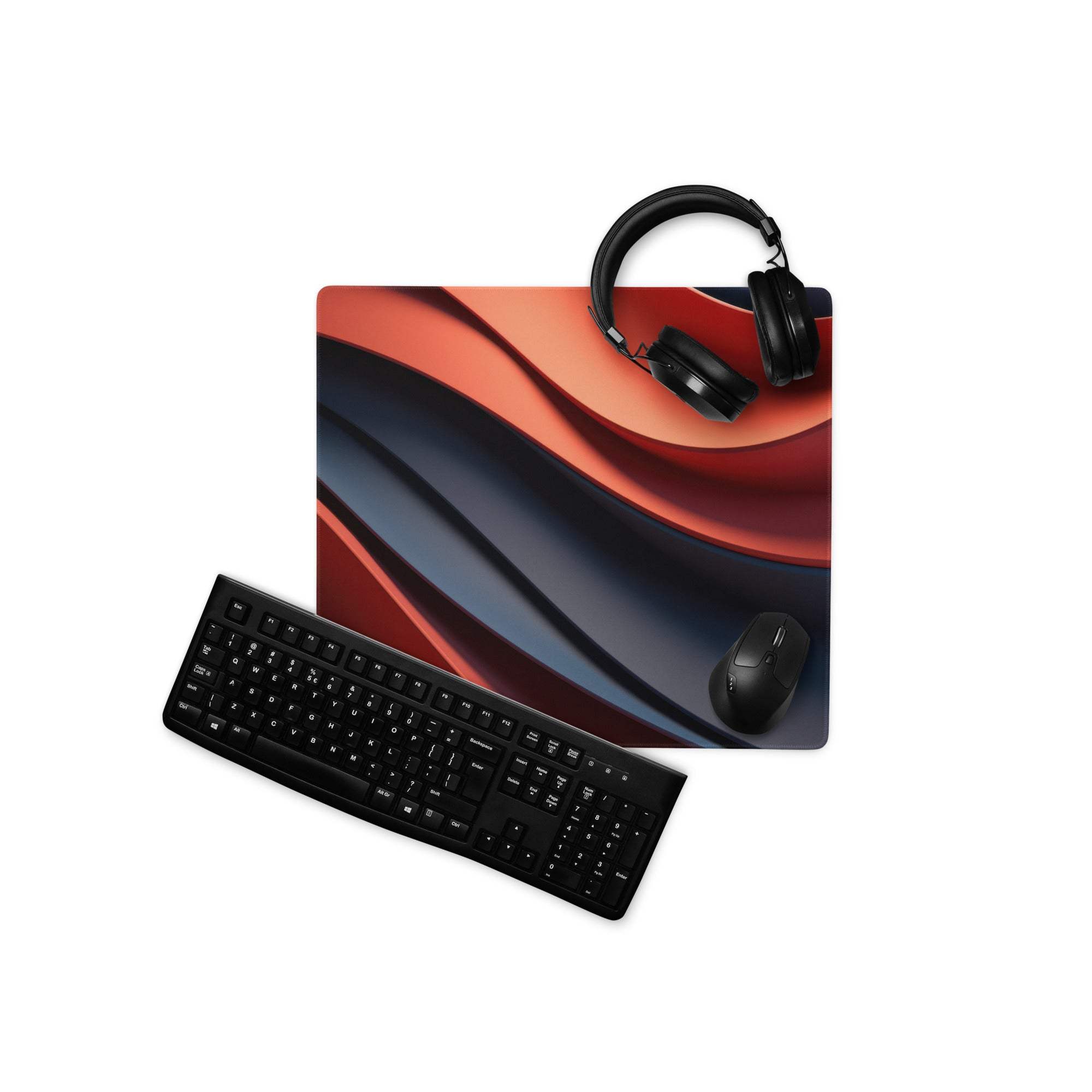 Black wireless keyboard on large bold red blue wave gaming mouse pad