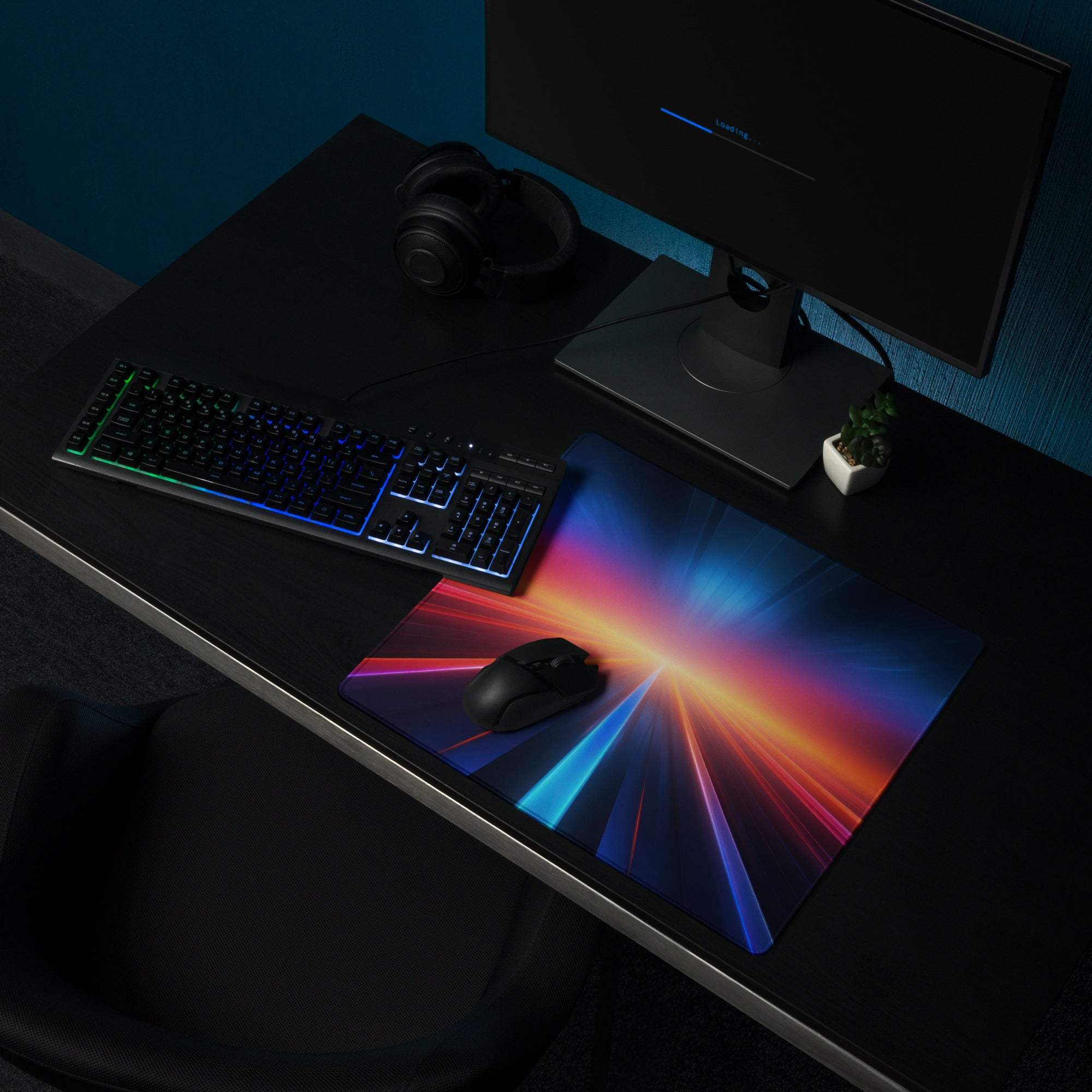 Vibrant cosmic gaming mousepad with neon red orange blue streaks and edge stitching