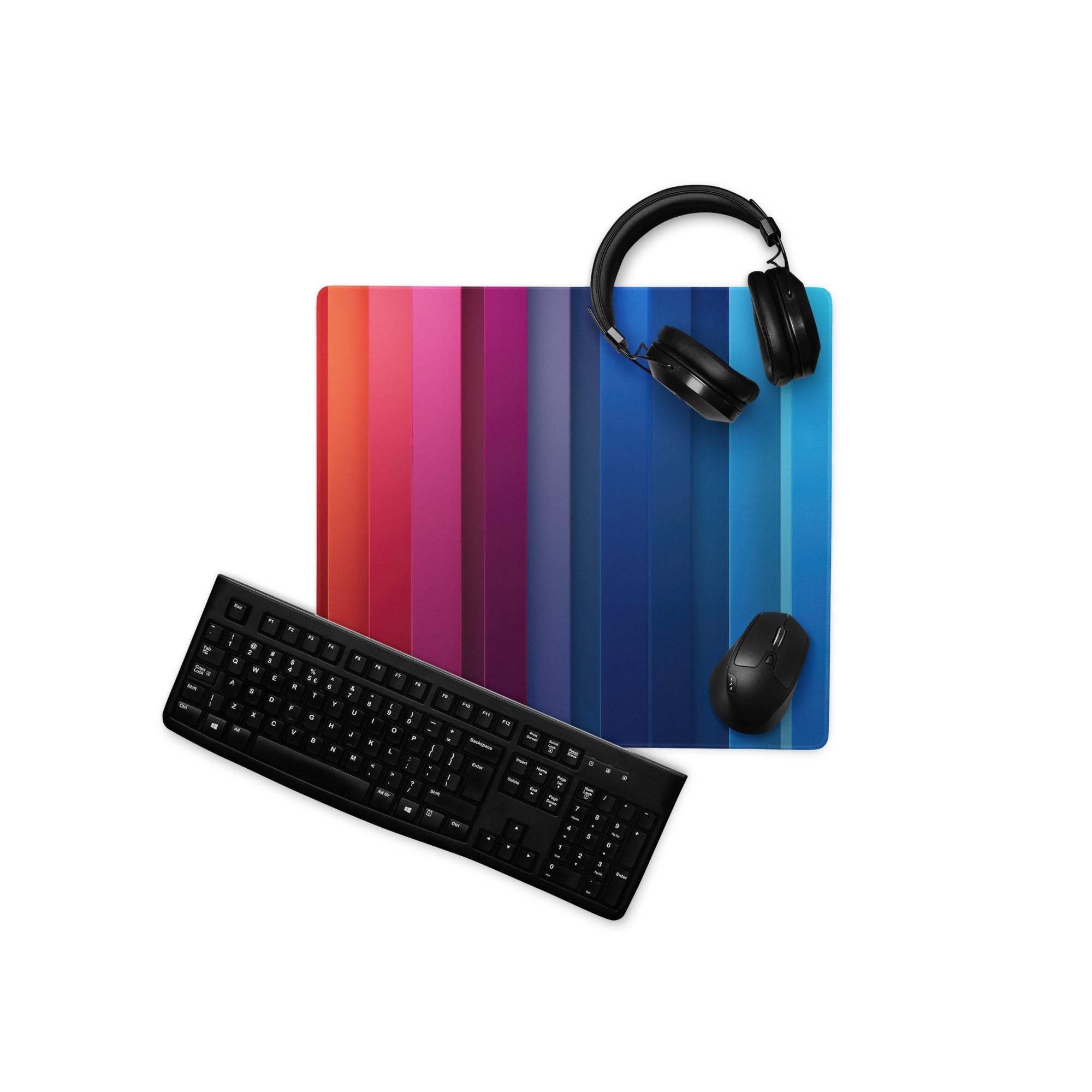 Vibrant rainbow gradient gaming mouse pad with orange to pink, purple, blue stripes