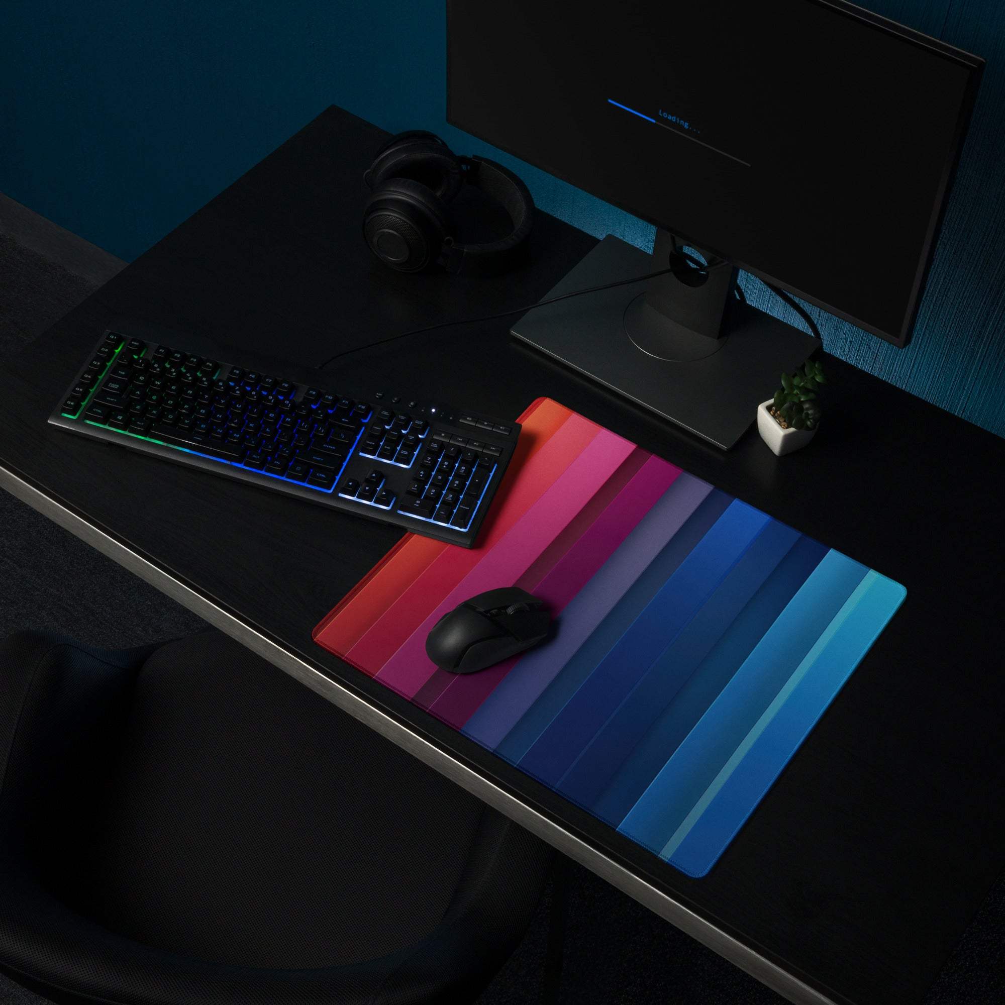 Vibrant rainbow gradient gaming mouse pad with large surface, non-slip base, stitched edges