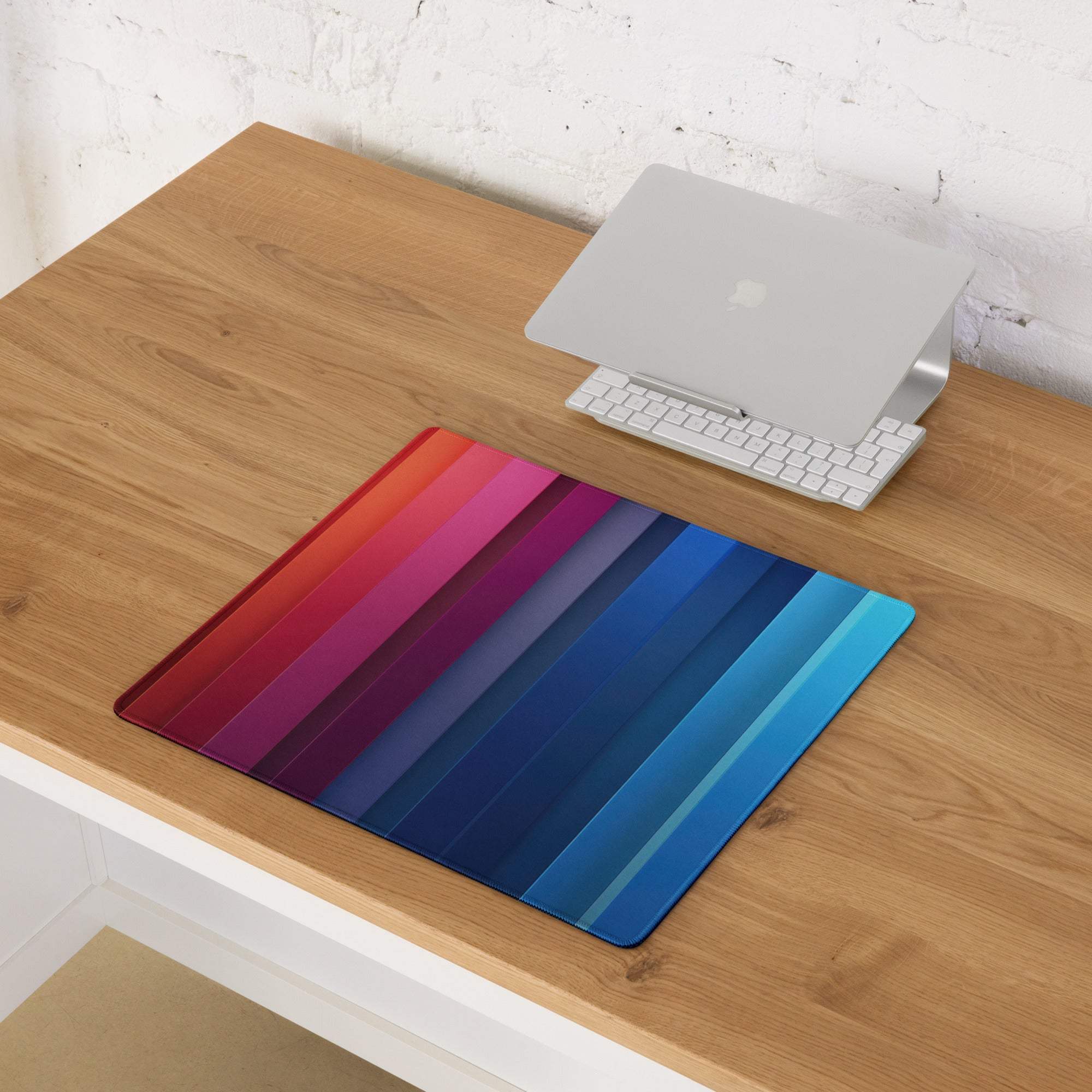 Vibrant rainbow gradient gaming mouse pad with large surface and non-slip base