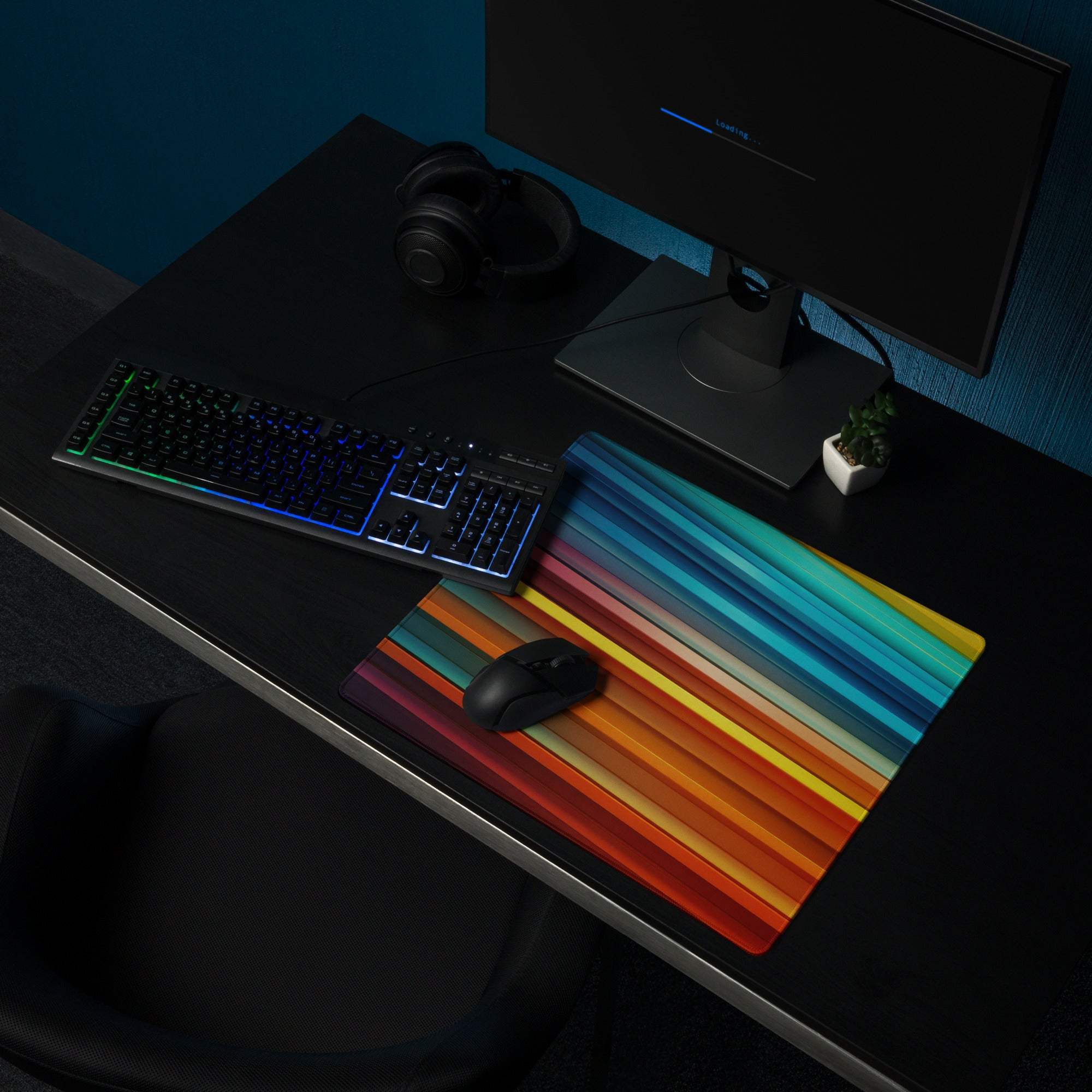Vibrant rainbow-striped gaming mouse pad with non-slip base and stitched edges