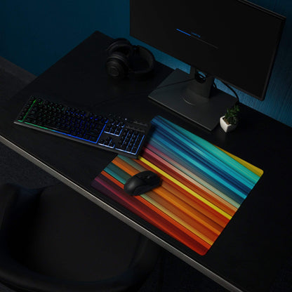 Vibrant rainbow-striped gaming mouse pad with non-slip base and stitched edges