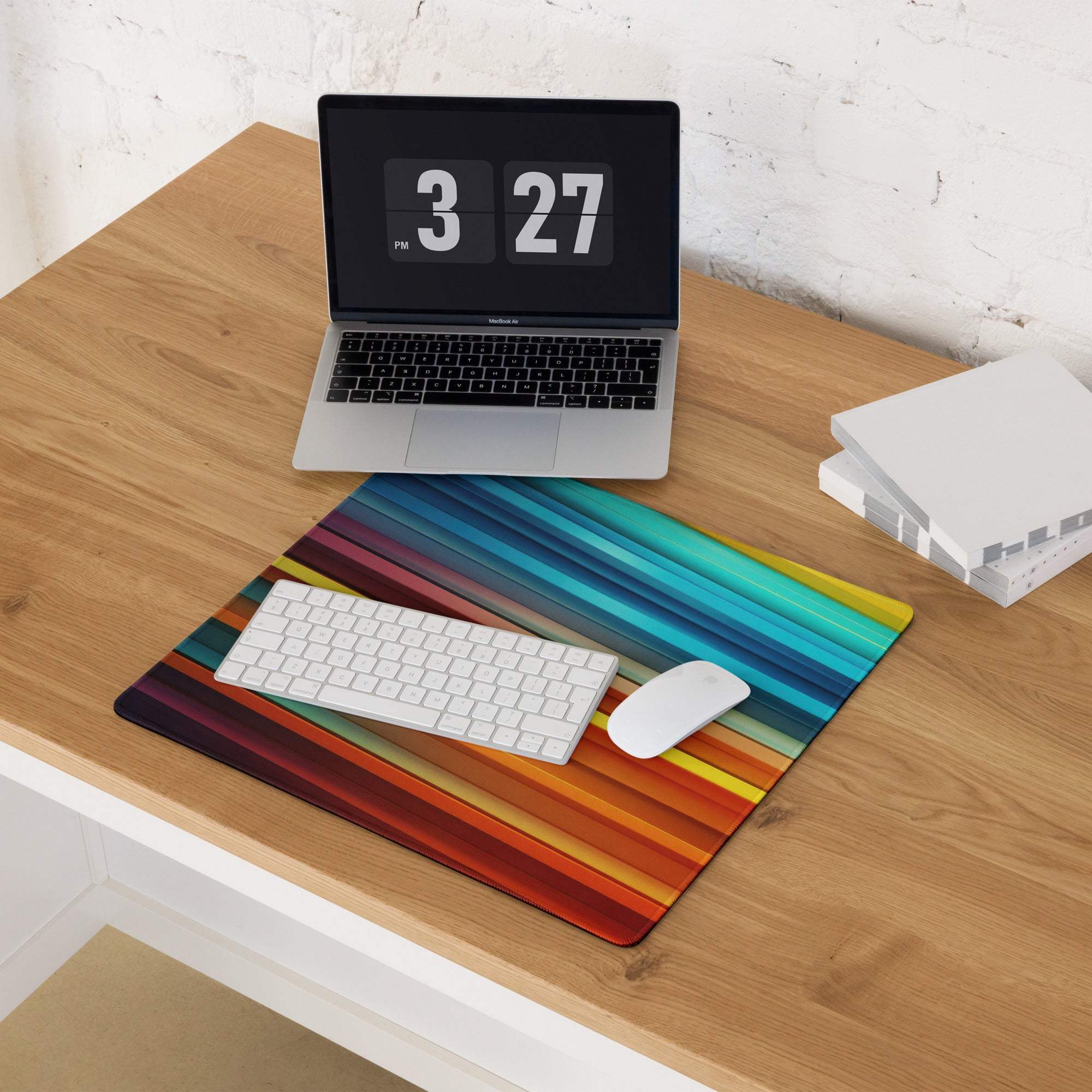 Vibrant striped spectrum gaming mouse pad in blue teal orange red with non-slip base