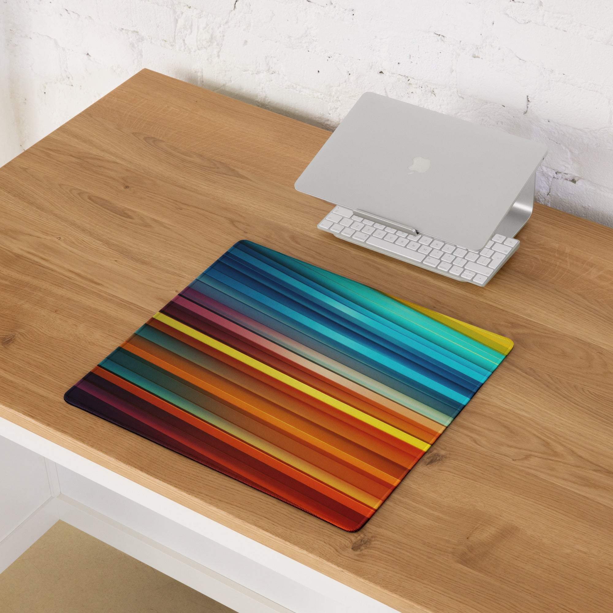 Vibrant striped spectrum gaming mouse pad in blues greens oranges reds