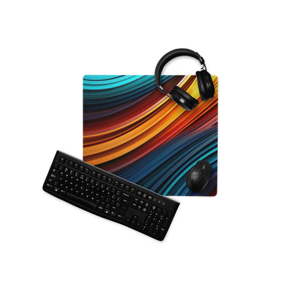 Vibrant rainbow wave gaming mouse pad with black headphones on top