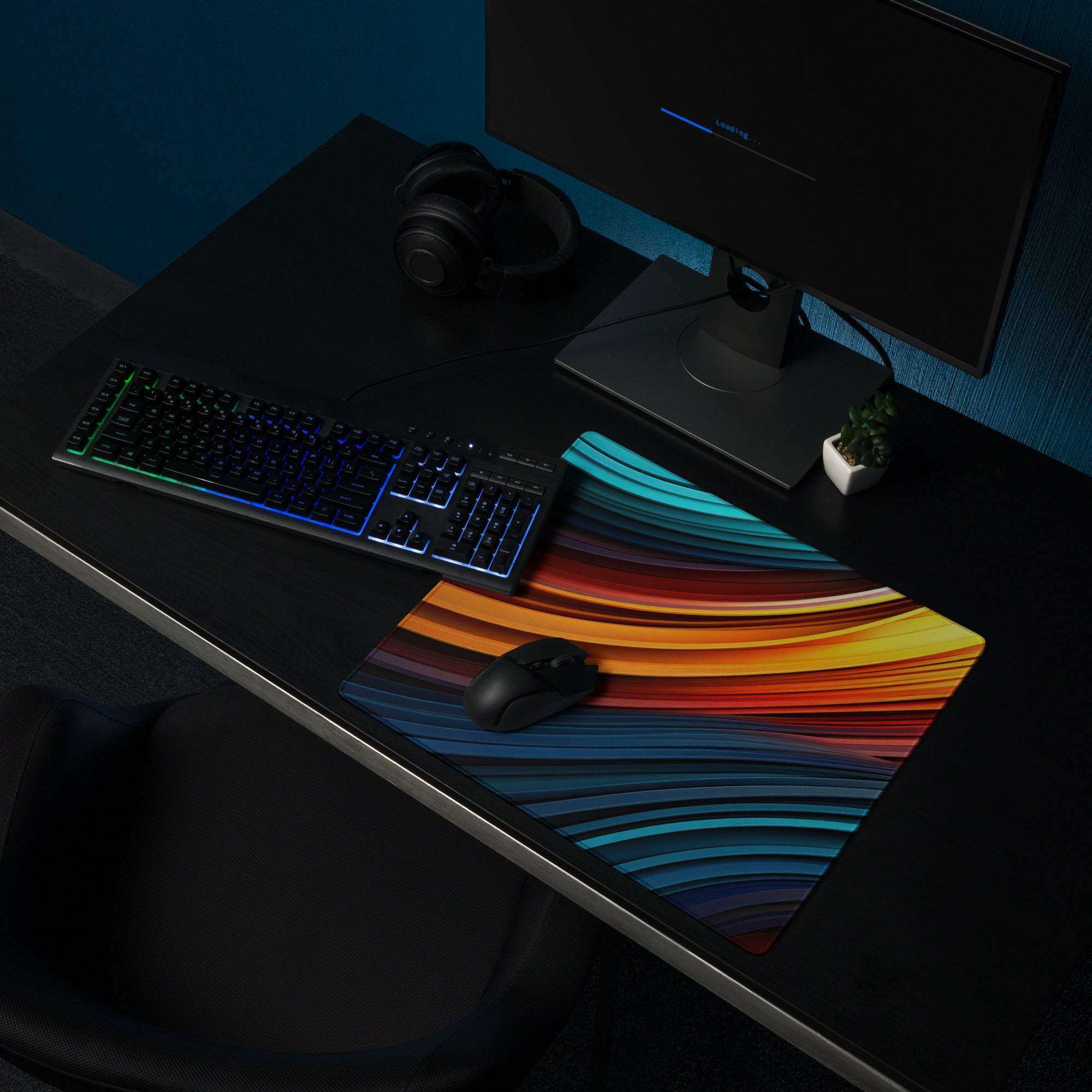 Vibrant abstract wave gaming mouse pad with rainbow gradient and non-slip edges